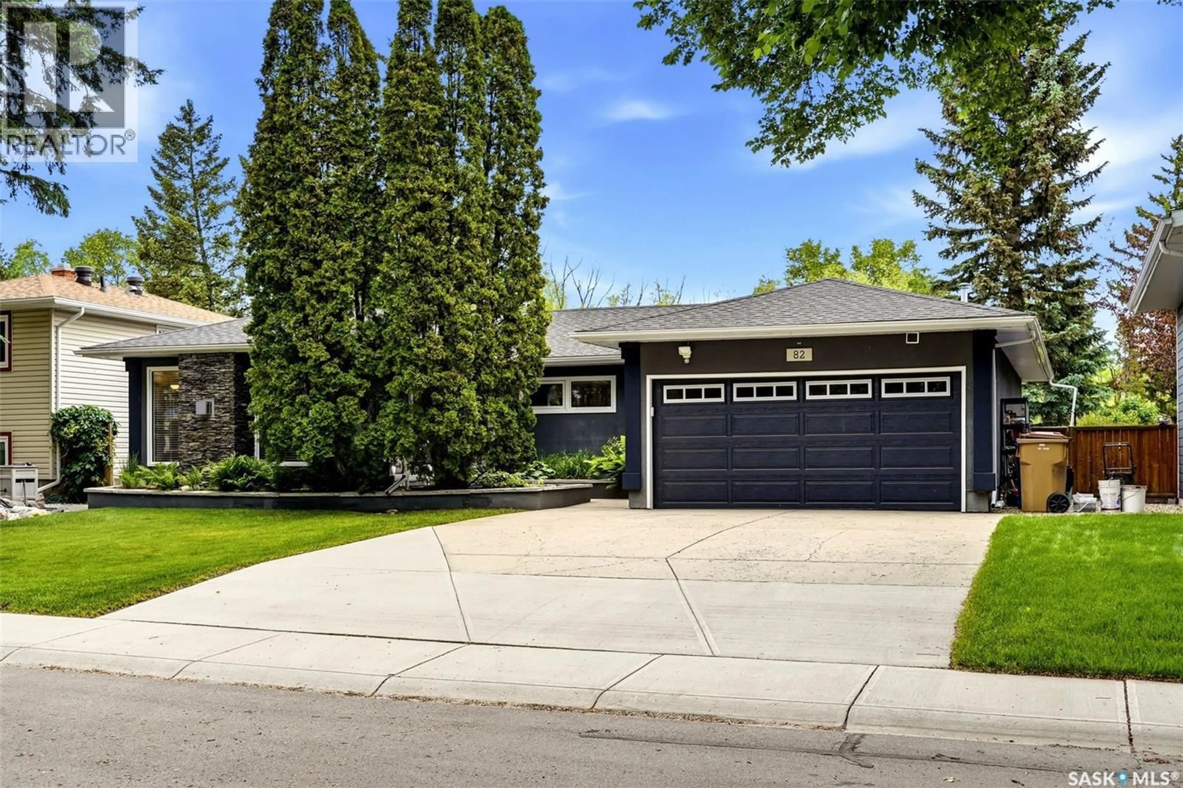 Home with vinyl exterior material, street for 82 COMPTON ROAD, Regina Saskatchewan S4S2Y3