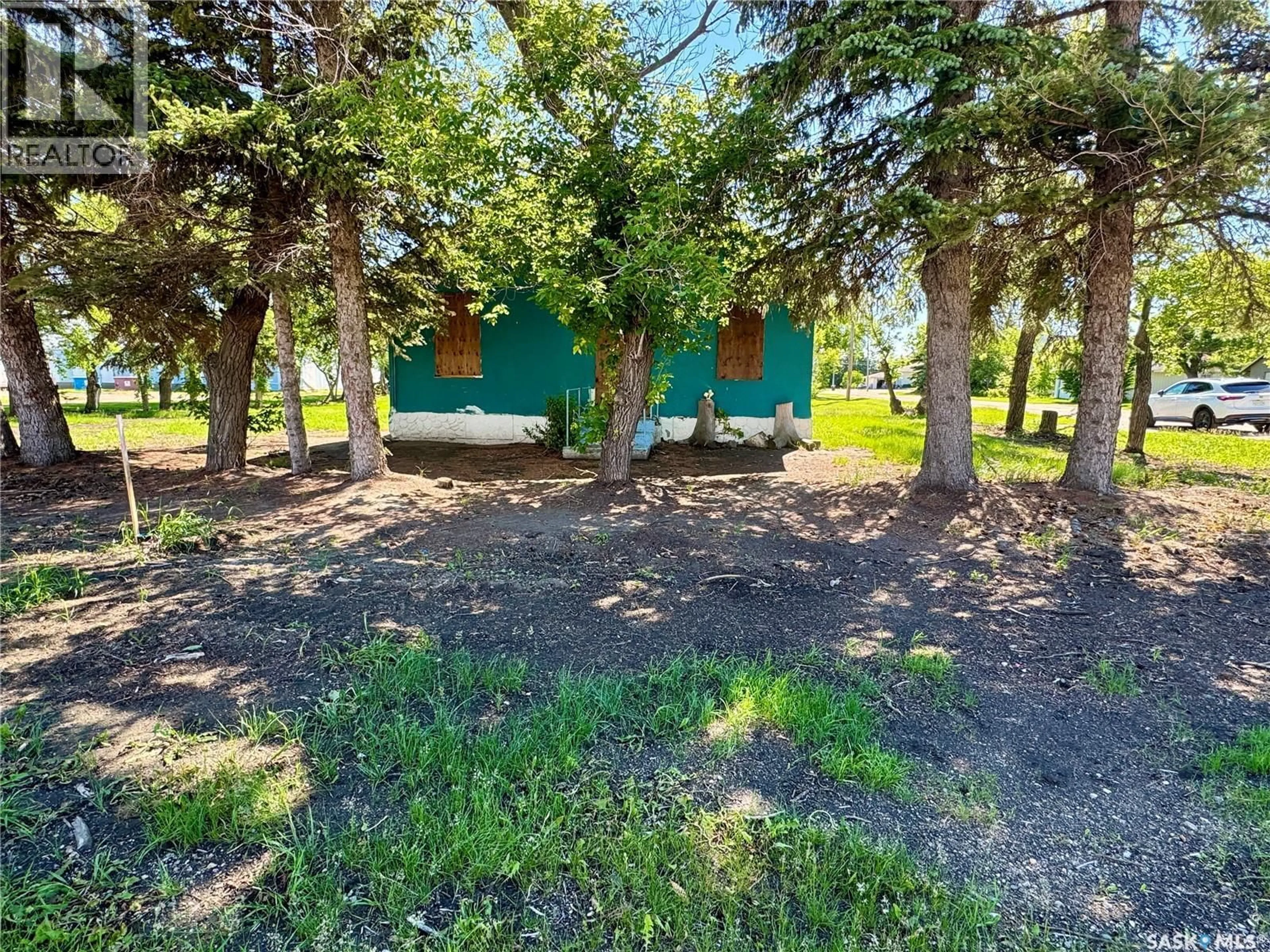 A pic from outside/outdoor area/front of a property/back of a property/a pic from drone, forest/trees view for 200 OTTER STREET, Cut Knife Saskatchewan S0M0N0