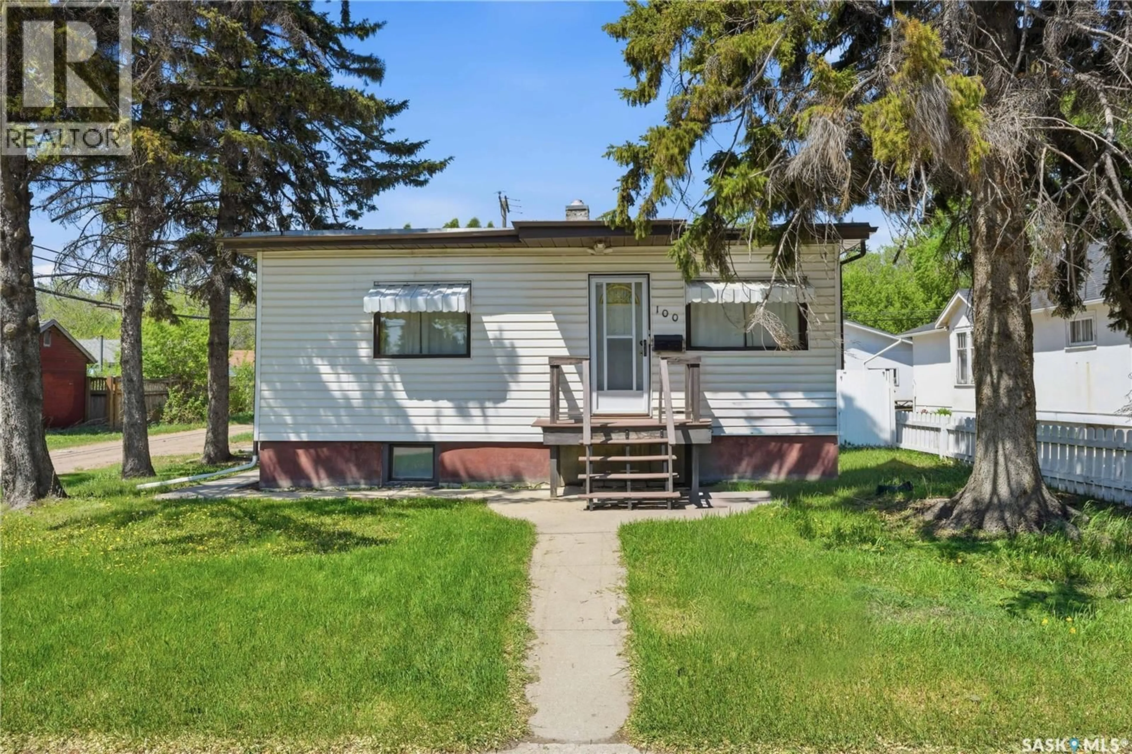 Home with vinyl exterior material, street for 100 CRUISE STREET, Saskatoon Saskatchewan S7N2C1