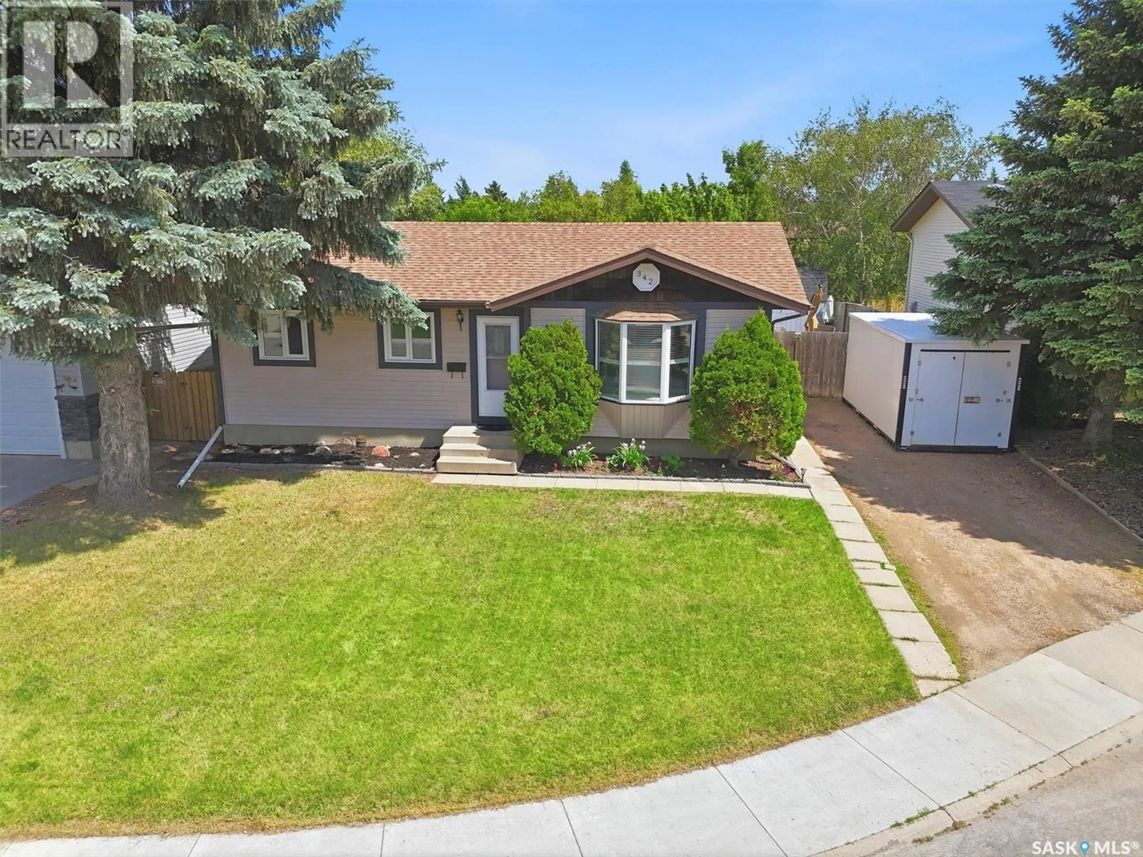 A pic from outside/outdoor area/front of a property/back of a property/a pic from drone, street for 342 WOLLASTON RISE, Saskatoon Saskatchewan S7J4G5