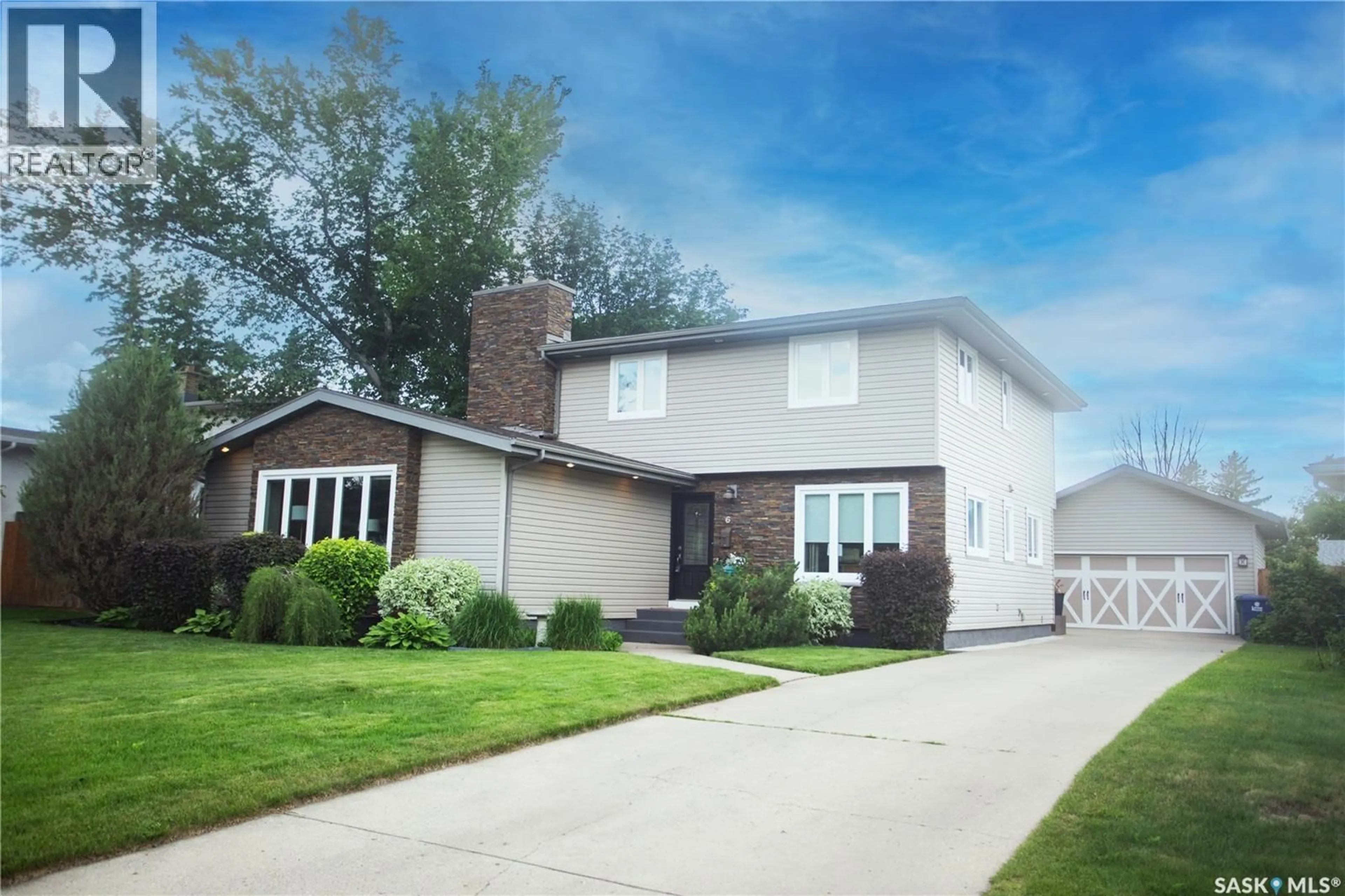 Home with vinyl exterior material, street for 6 HARRINGTON PLACE, Saskatoon Saskatchewan S7H3Y5