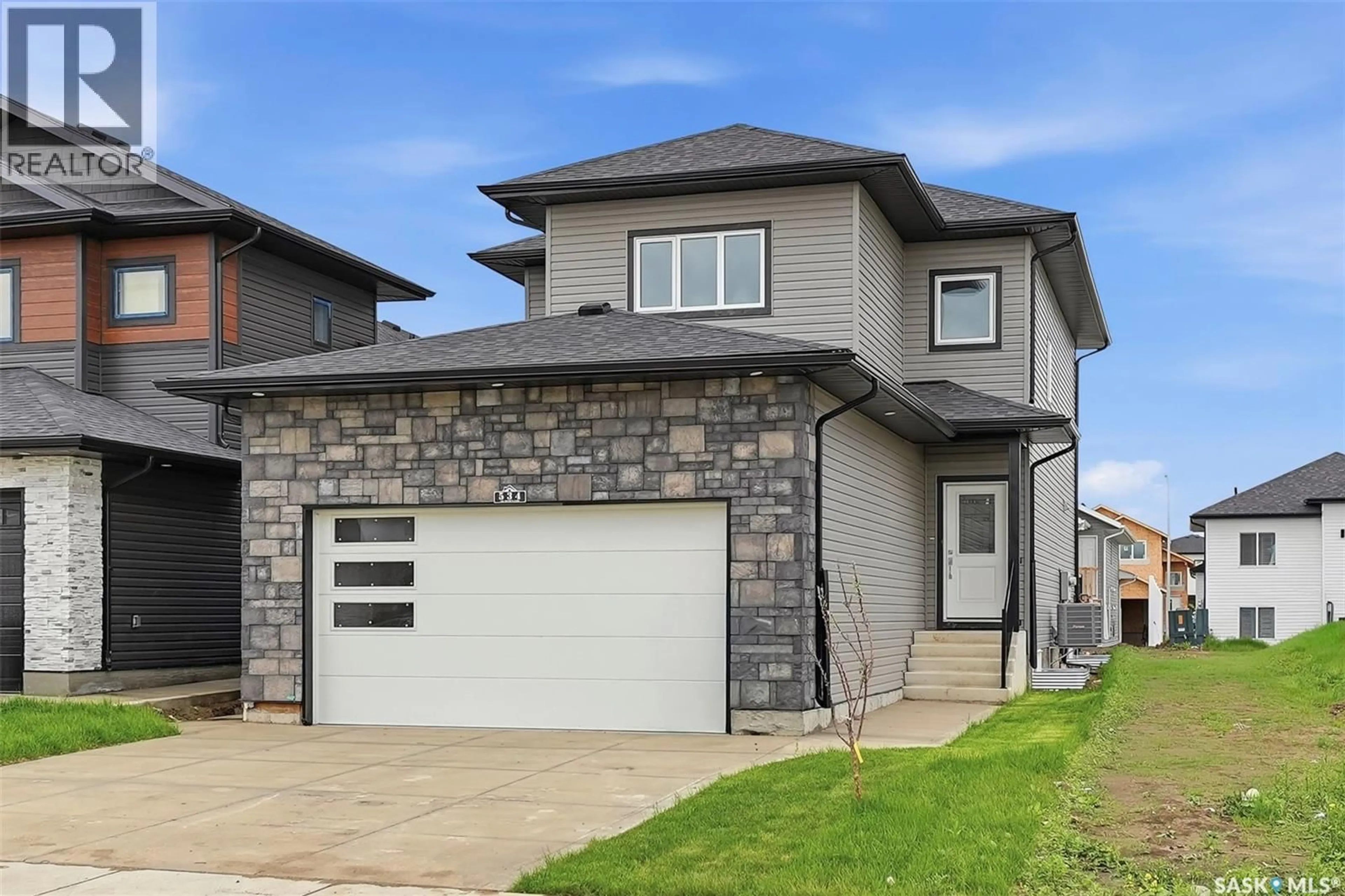 Home with brick exterior material, street for 534 SHARMA CRESCENT, Saskatoon Saskatchewan S7W1K5