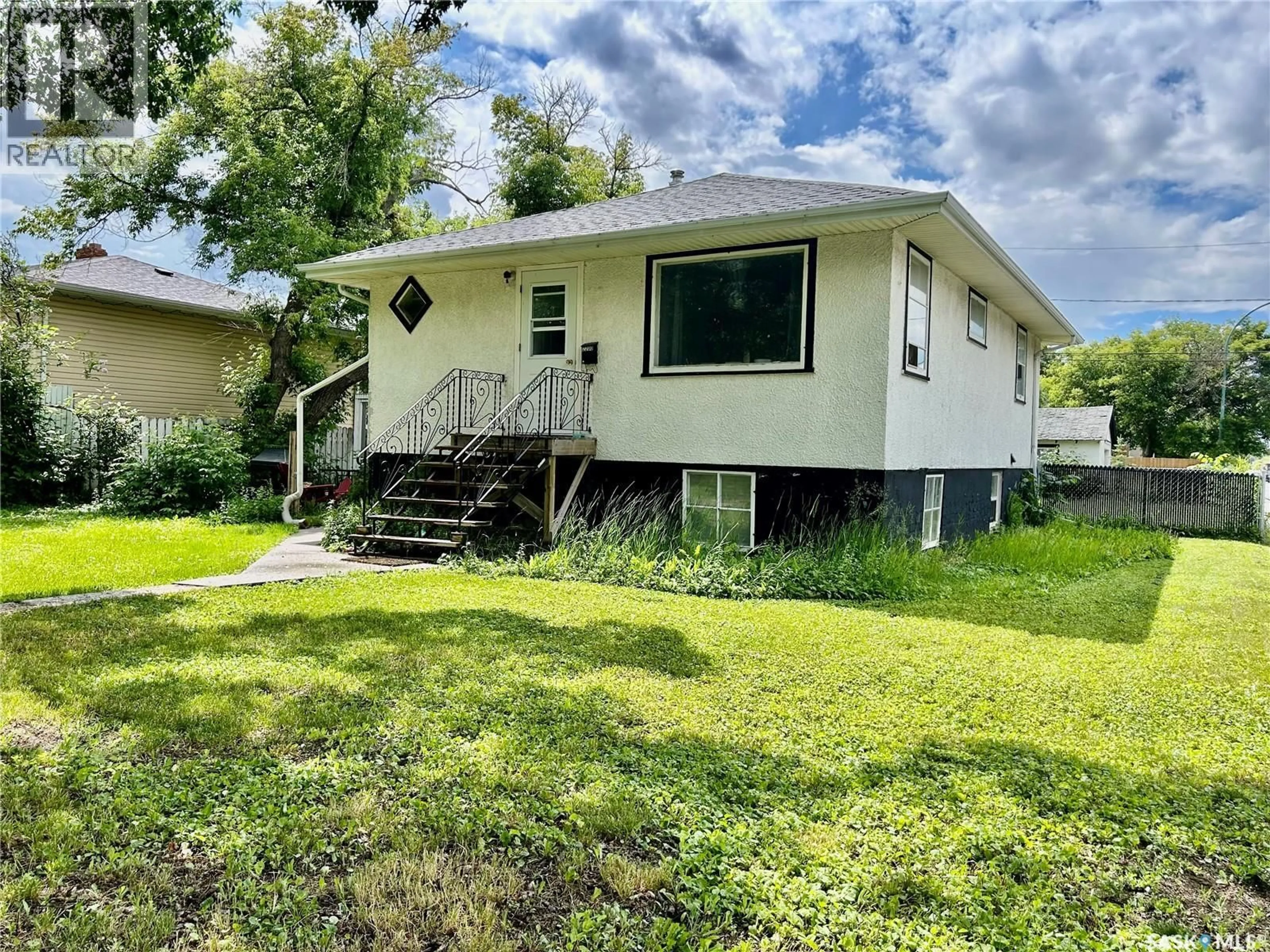 Home with vinyl exterior material, street for 2200 FRANCIS STREET, Regina Saskatchewan S4N2P5