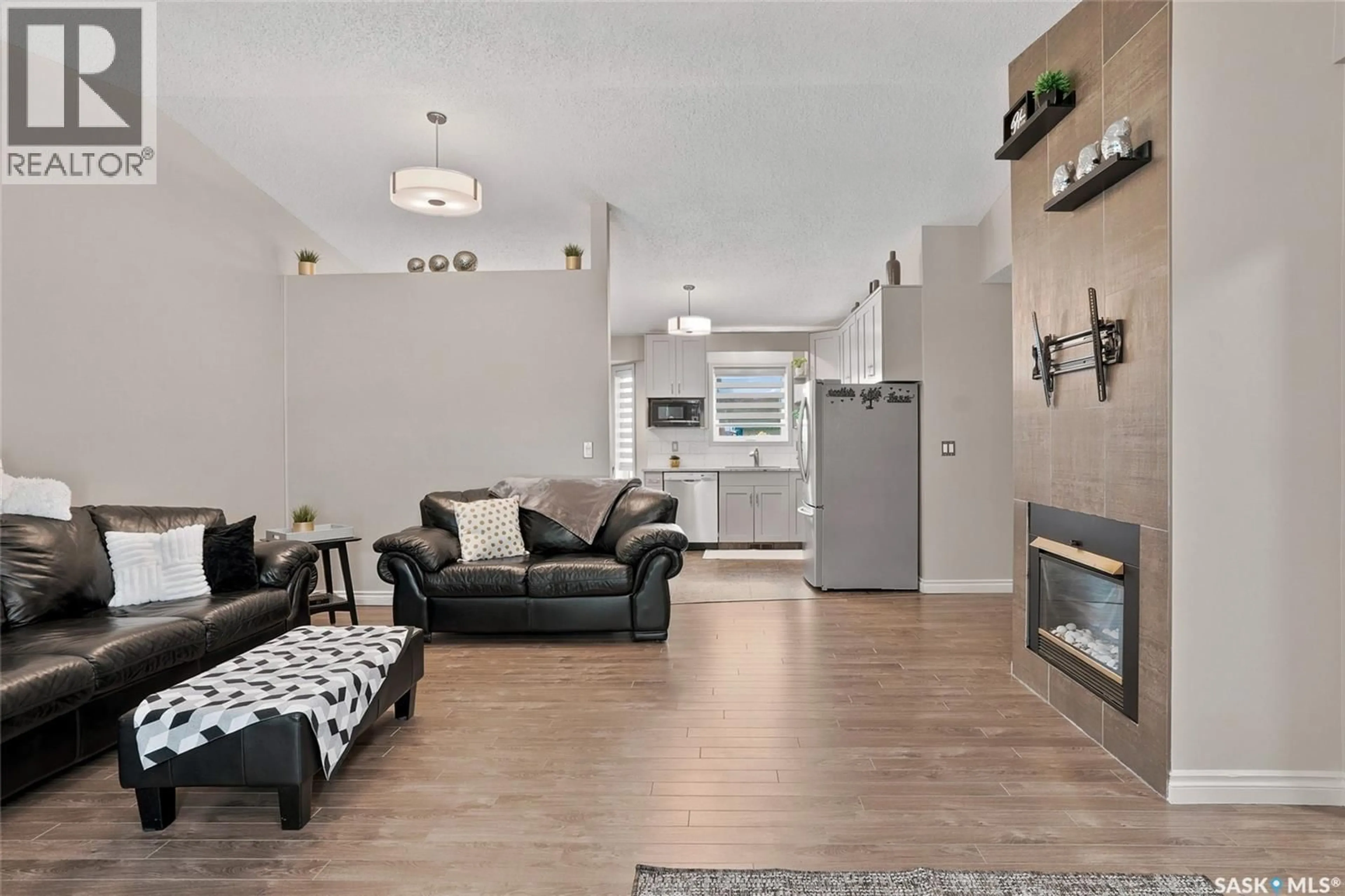 Living room with furniture, unknown for 103 BORNSTEIN CRESCENT, Saskatoon Saskatchewan S7N3Y4