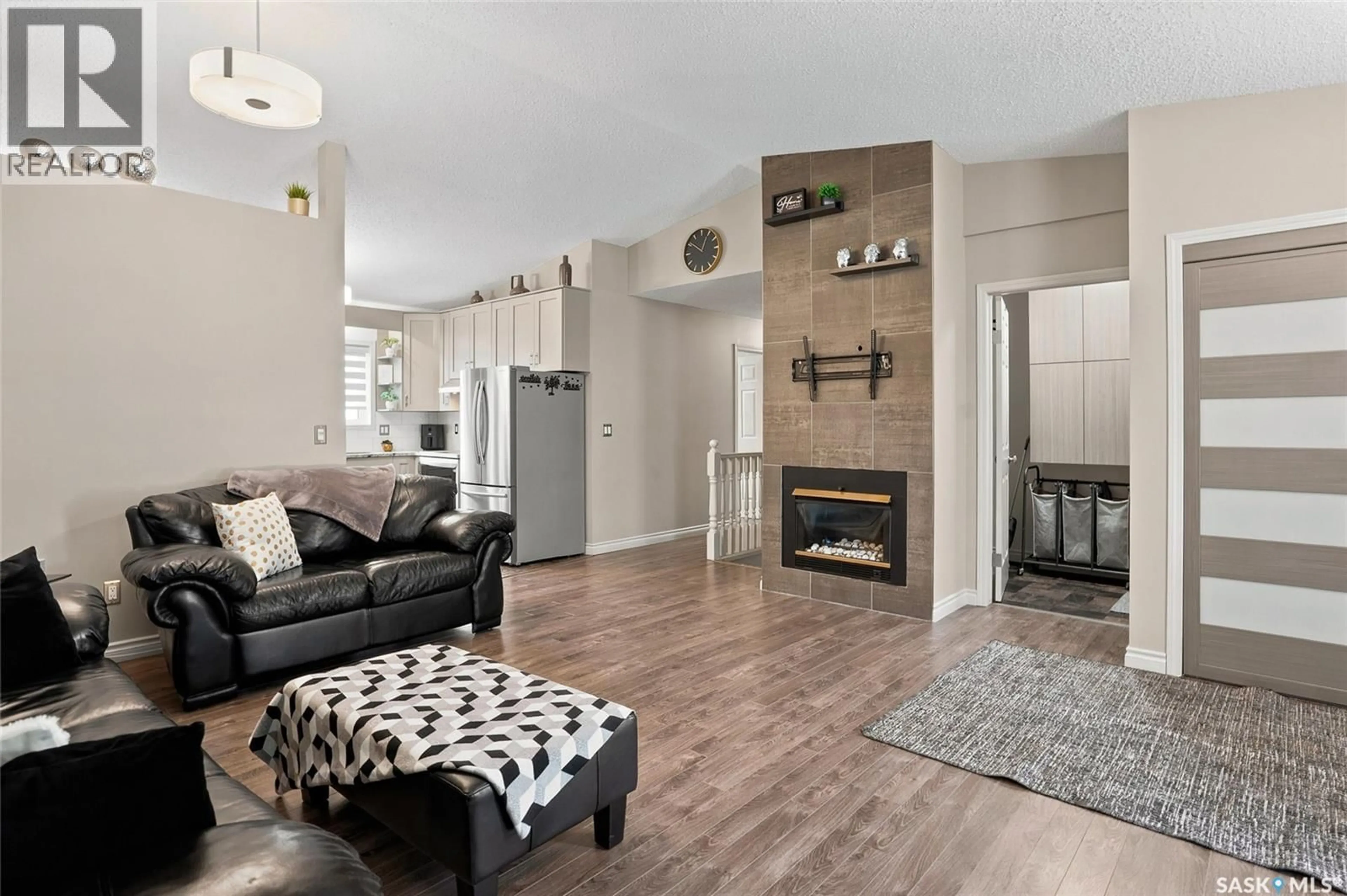 Living room with furniture, unknown for 103 BORNSTEIN CRESCENT, Saskatoon Saskatchewan S7N3Y4