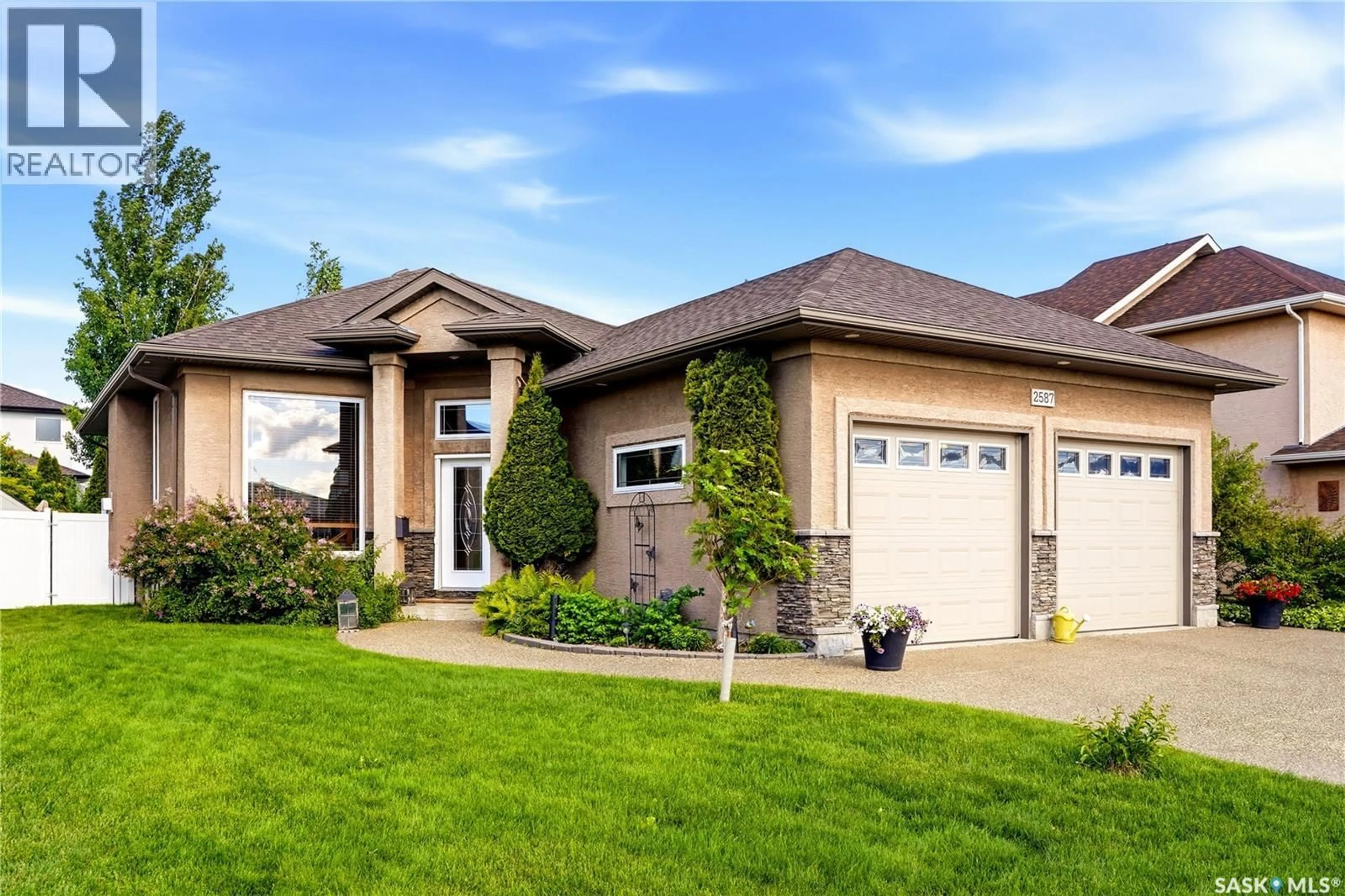 Home with vinyl exterior material, street for 2587 LINNER WAY, Regina Saskatchewan S4V1E7