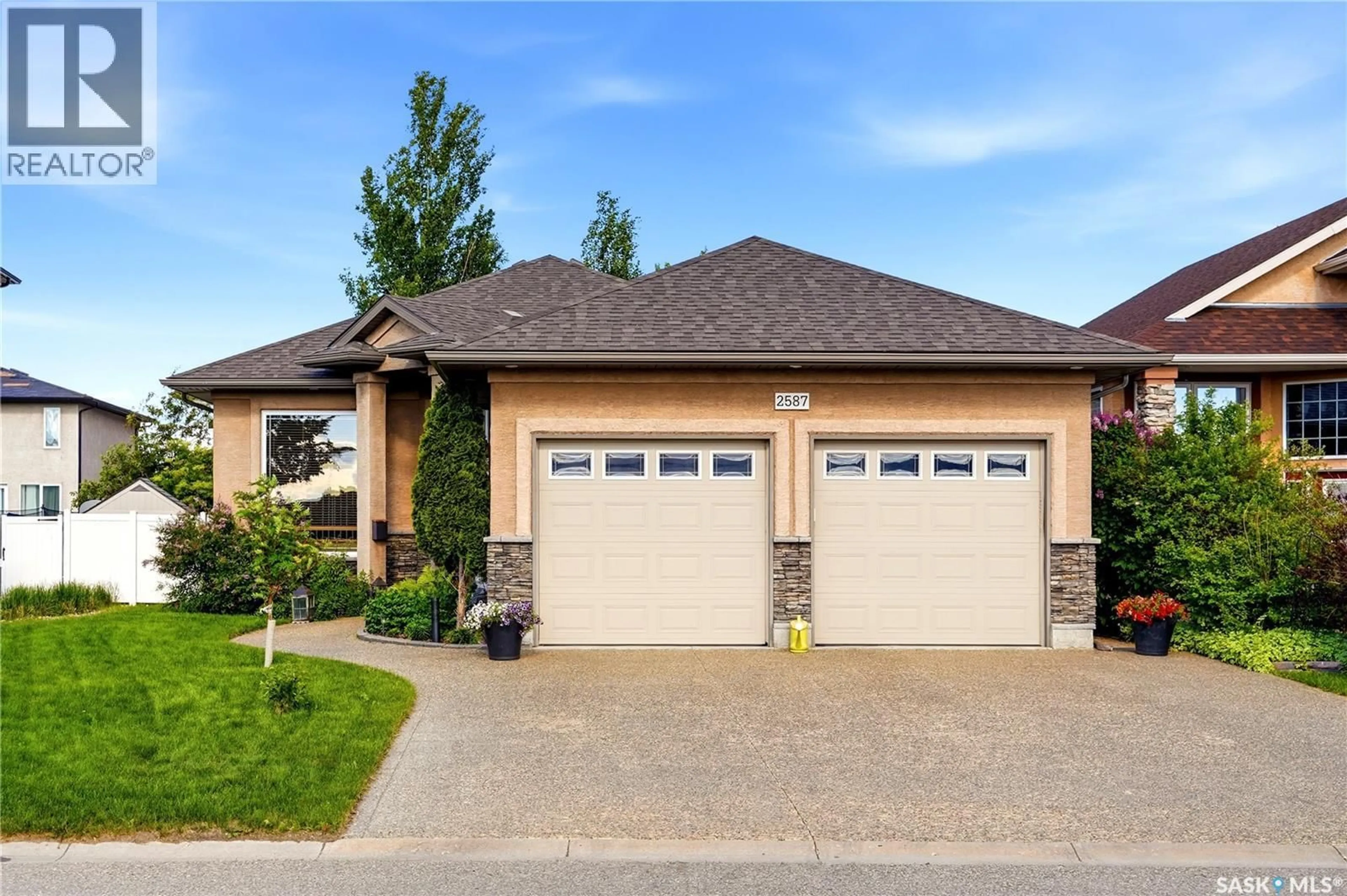 Home with brick exterior material, street for 2587 LINNER WAY, Regina Saskatchewan S4V1E7
