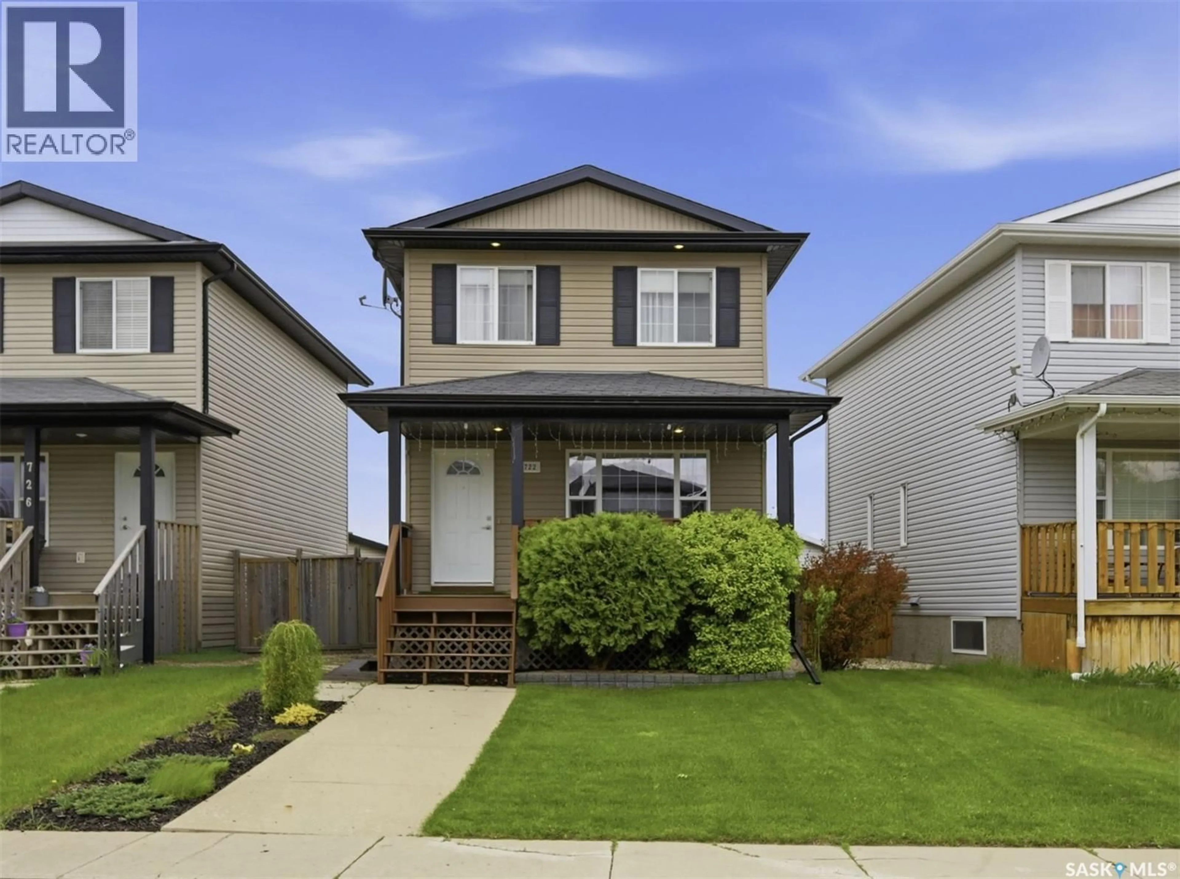 Home with vinyl exterior material, street for 722 LAMARSH LANE, Saskatoon Saskatchewan S7W1B6
