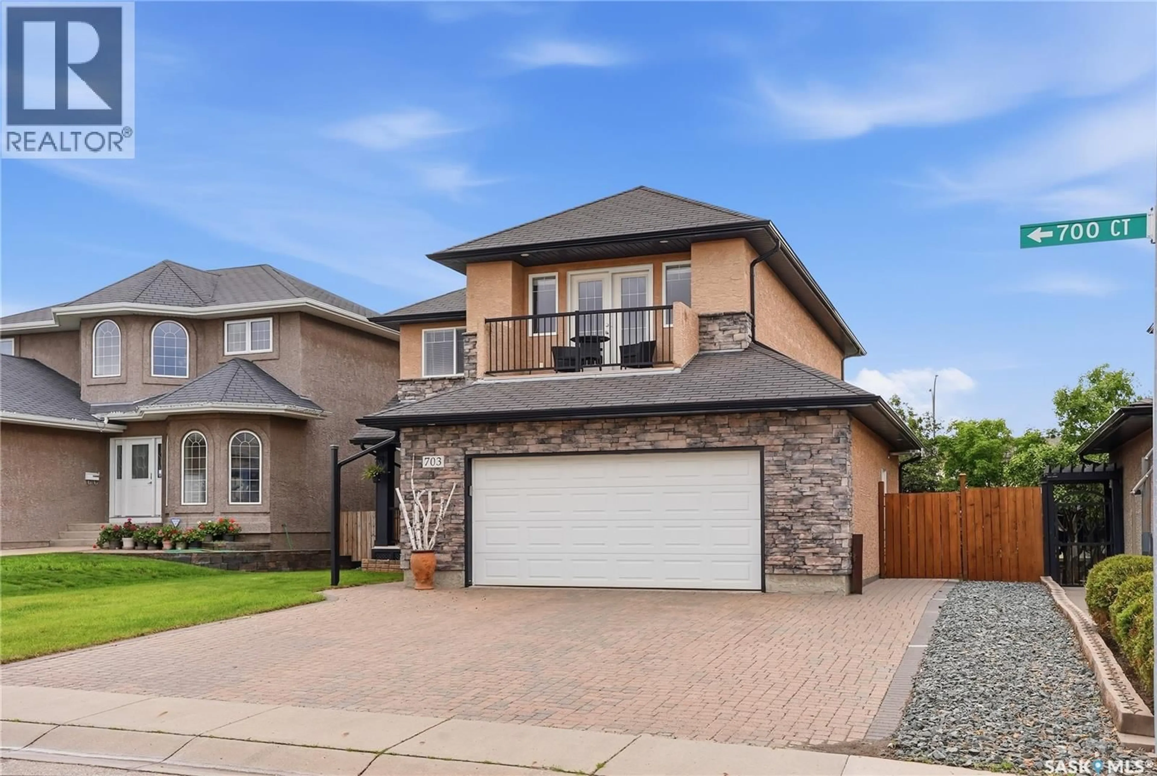 Home with brick exterior material, street for 703 BELLMONT COURT, Saskatoon Saskatchewan S7V1K7