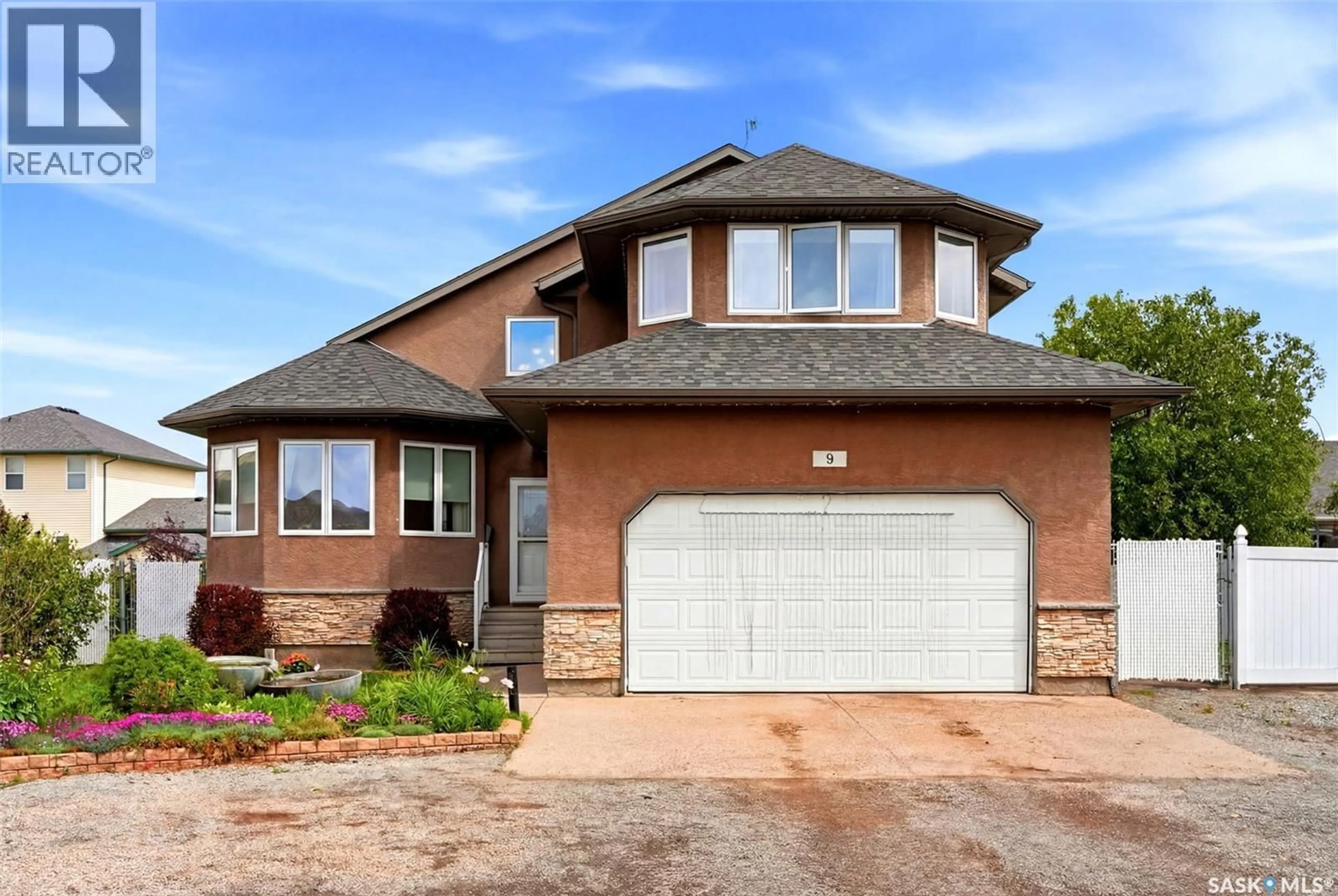Home with brick exterior material, street for 9 BRAYDEN BAY, Grand Coulee Saskatchewan S4M0A3