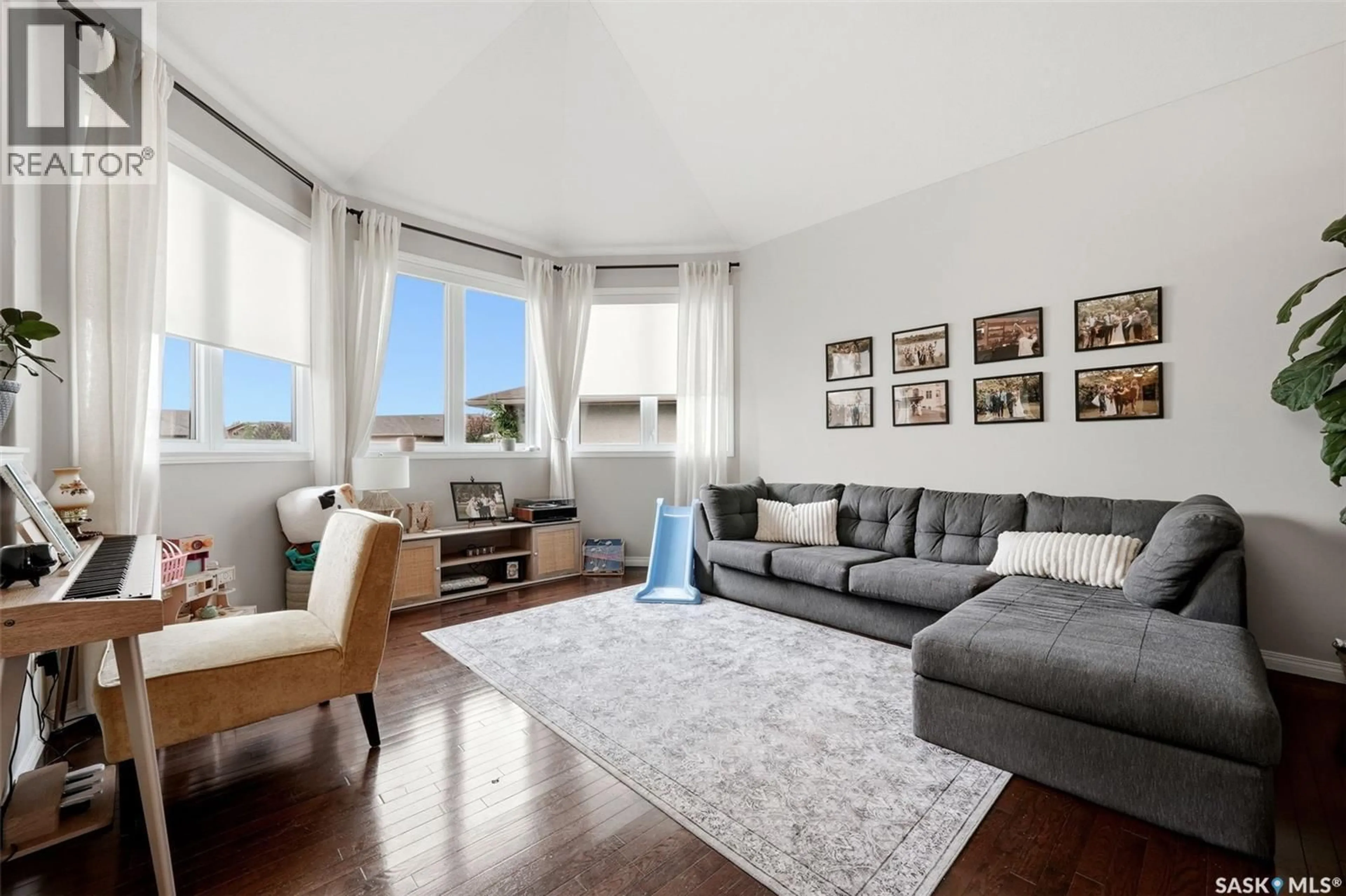 Living room with furniture, unknown for 9 BRAYDEN BAY, Grand Coulee Saskatchewan S4M0A3