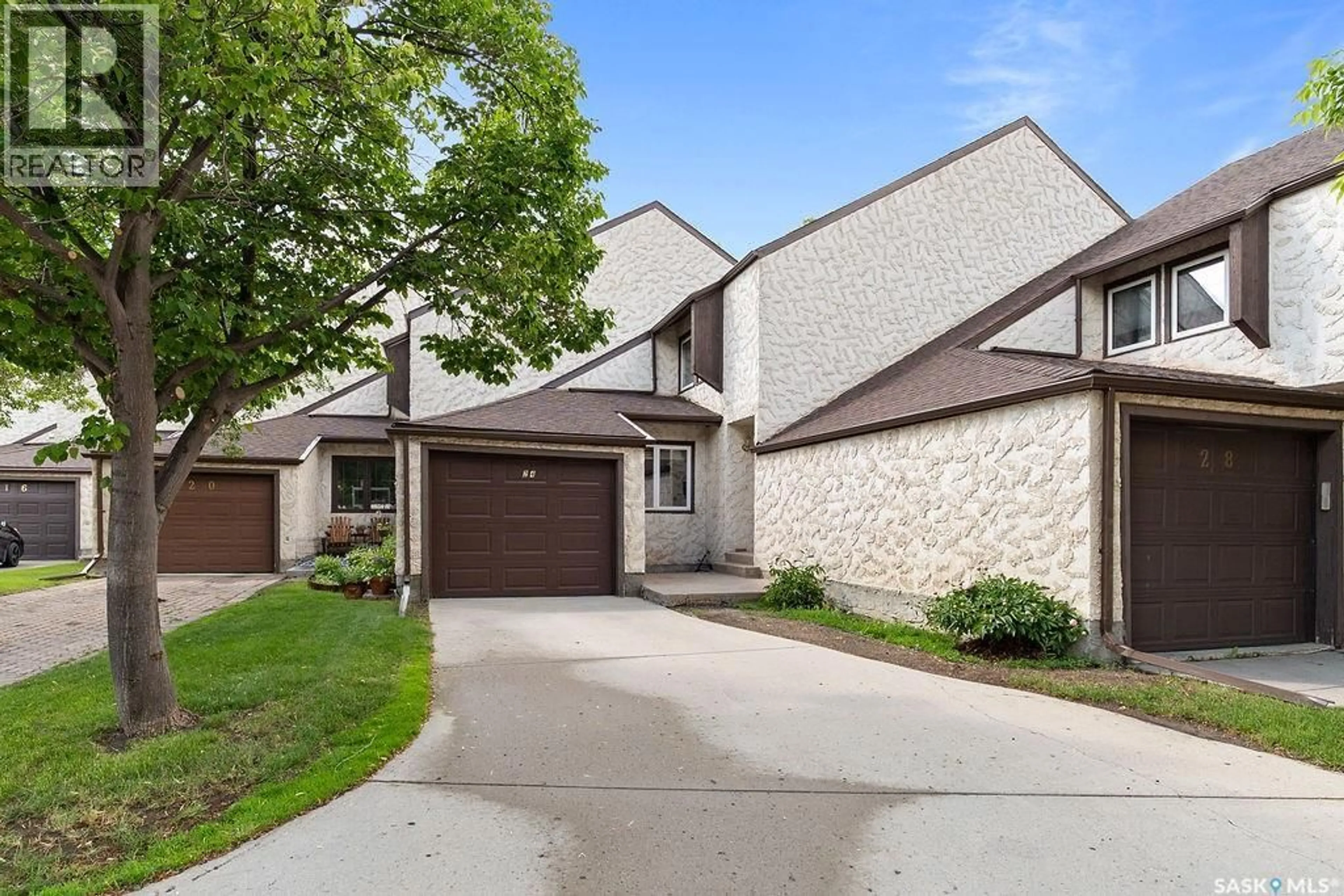 Home with brick exterior material, street for 24 CANNINGTON MEWS, Regina Saskatchewan S4S5Z7
