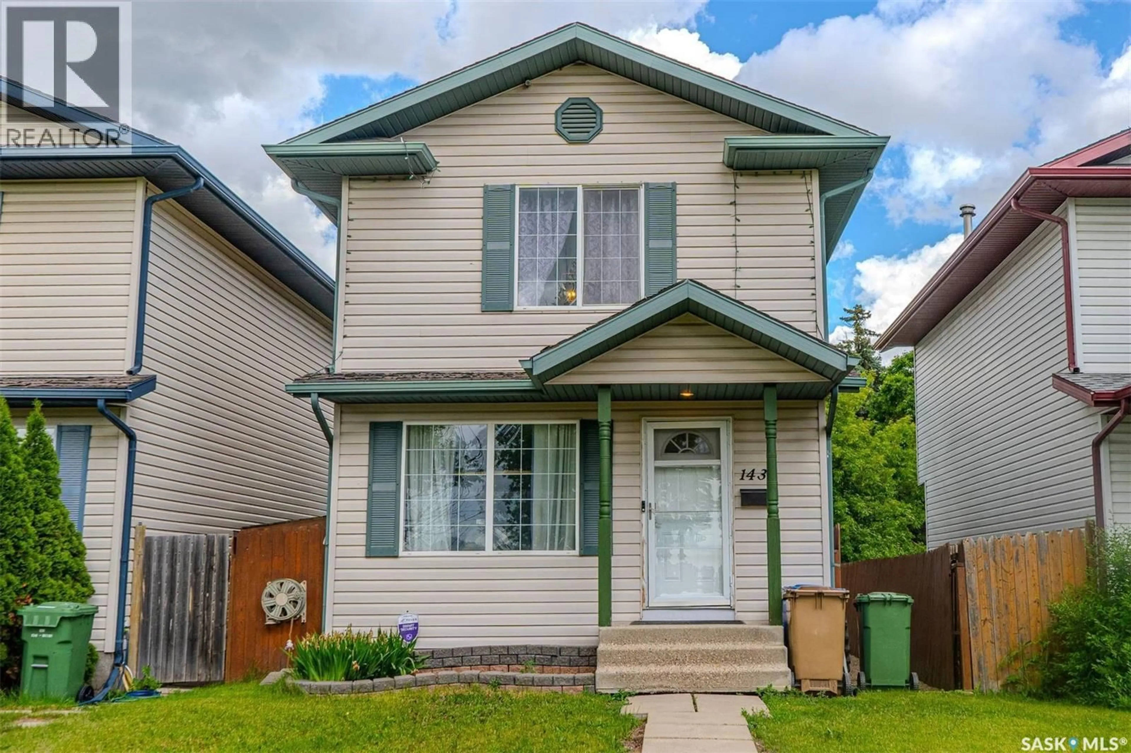 Home with vinyl exterior material, street for 1430 10TH AVENUE, Regina Saskatchewan S4N7P6