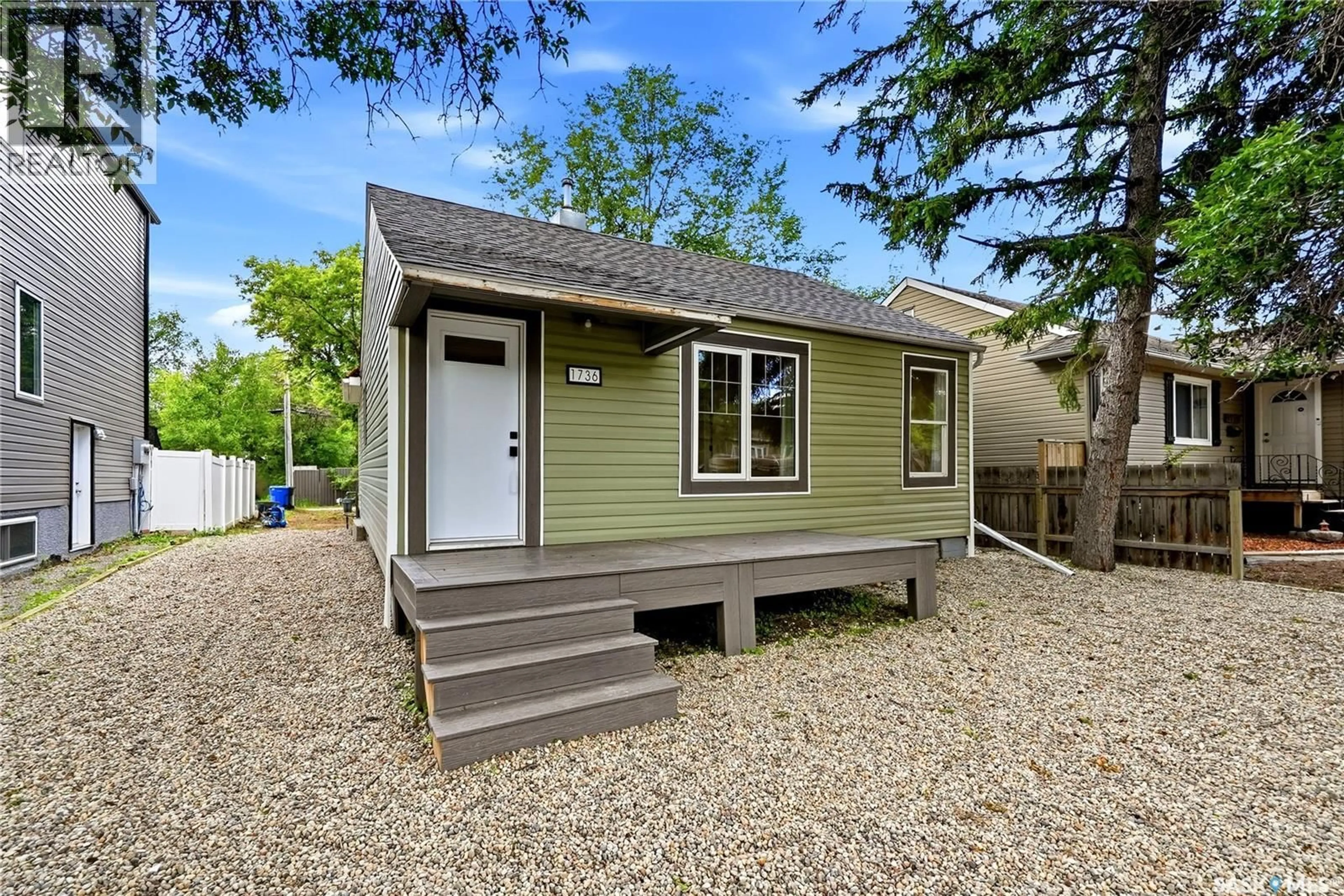 Home with vinyl exterior material, street for 1736 CONNAUGHT STREET, Regina Saskatchewan S4T4T2