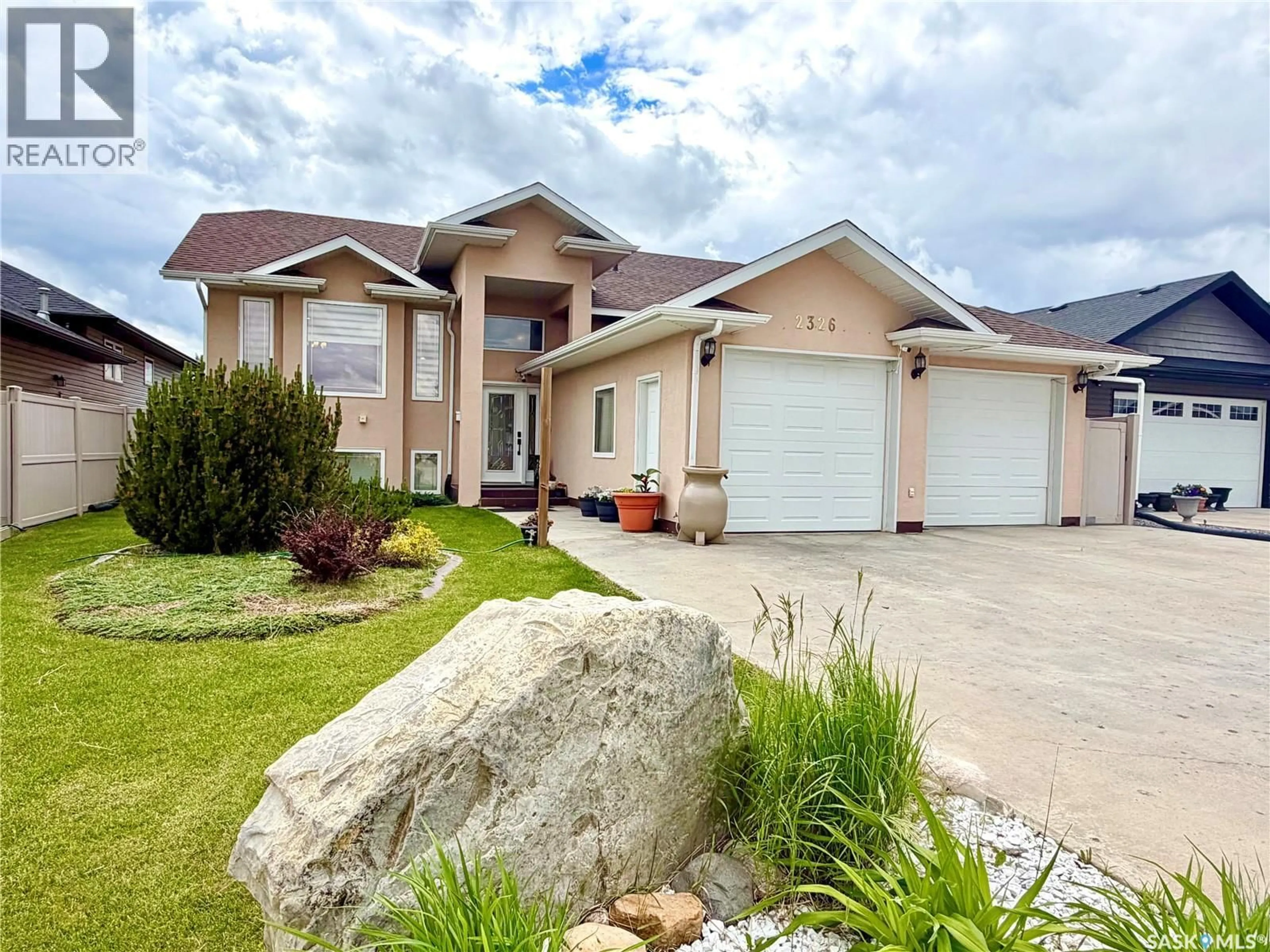 Home with vinyl exterior material, street for 2326 BUHLER BAY, North Battleford Saskatchewan S9A1J2