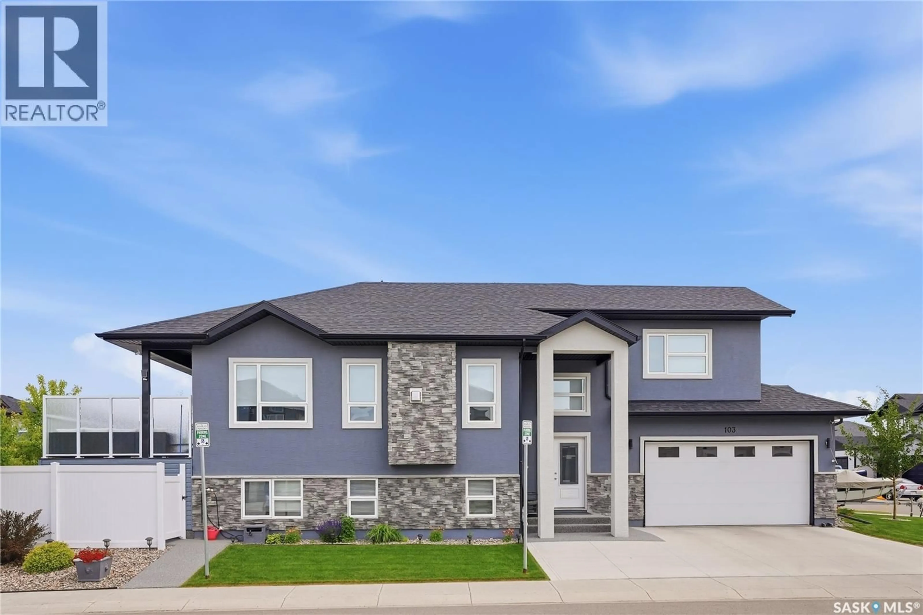 Home with vinyl exterior material, street for 103 BARRETT STREET, Saskatoon Saskatchewan S7W0Z6