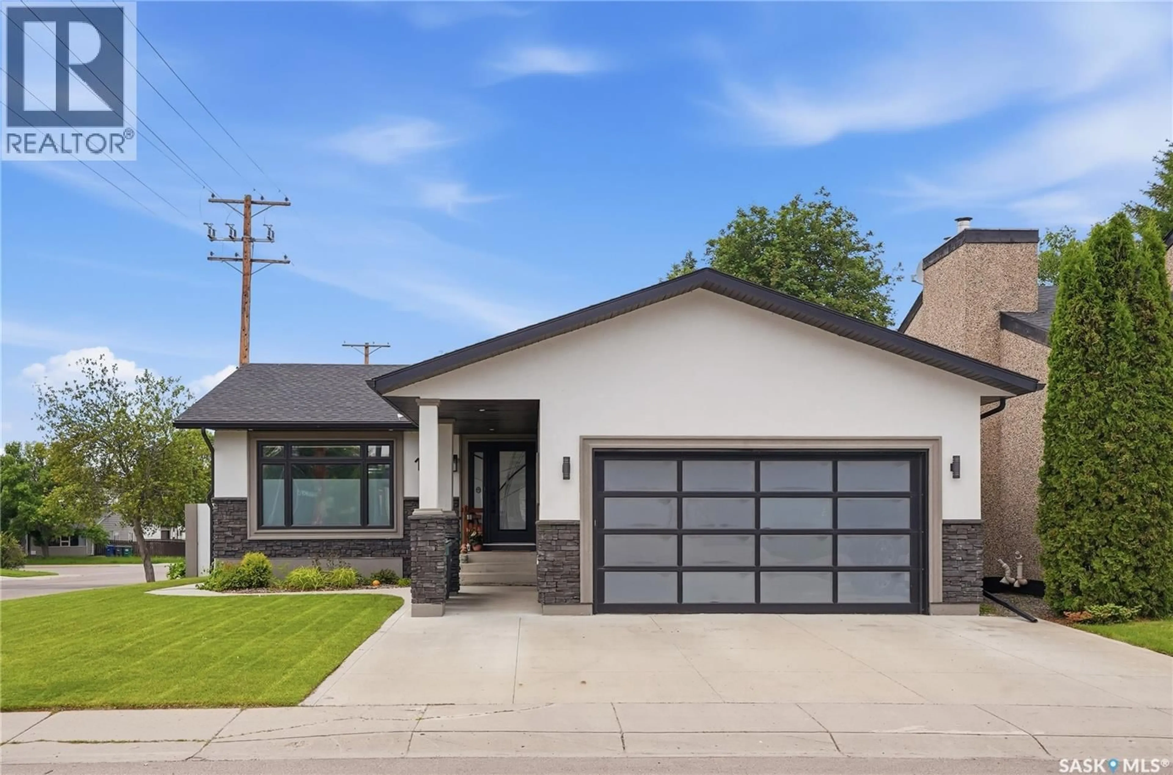 Home with brick exterior material, street for 103 MALLIN CRESCENT, Saskatoon Saskatchewan S7K7W9