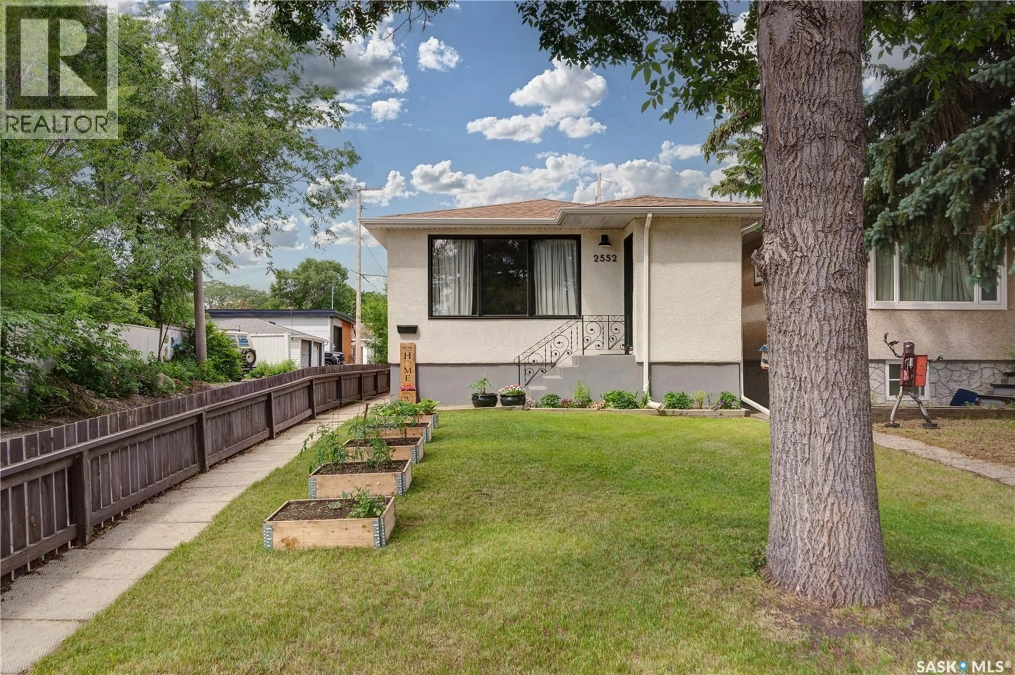 Home with vinyl exterior material, street for 2552 ELLIOTT STREET, Regina Saskatchewan S4N3H5