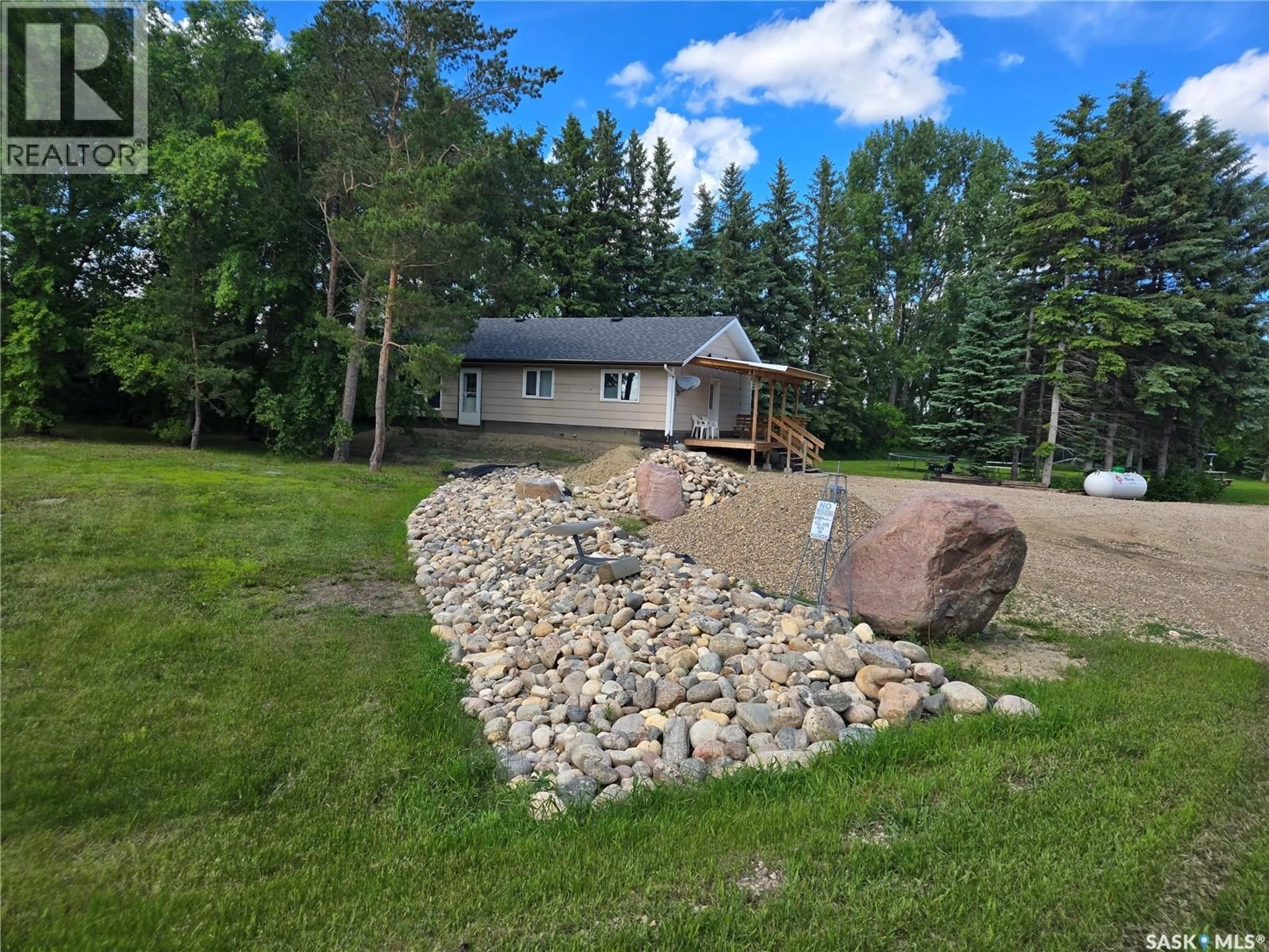 A pic from outside/outdoor area/front of a property/back of a property/a pic from drone, water/lake/river/ocean view for PRESTON ACREAGE, Moose Mountain Rm No. 63 Saskatchewan S0C1R0