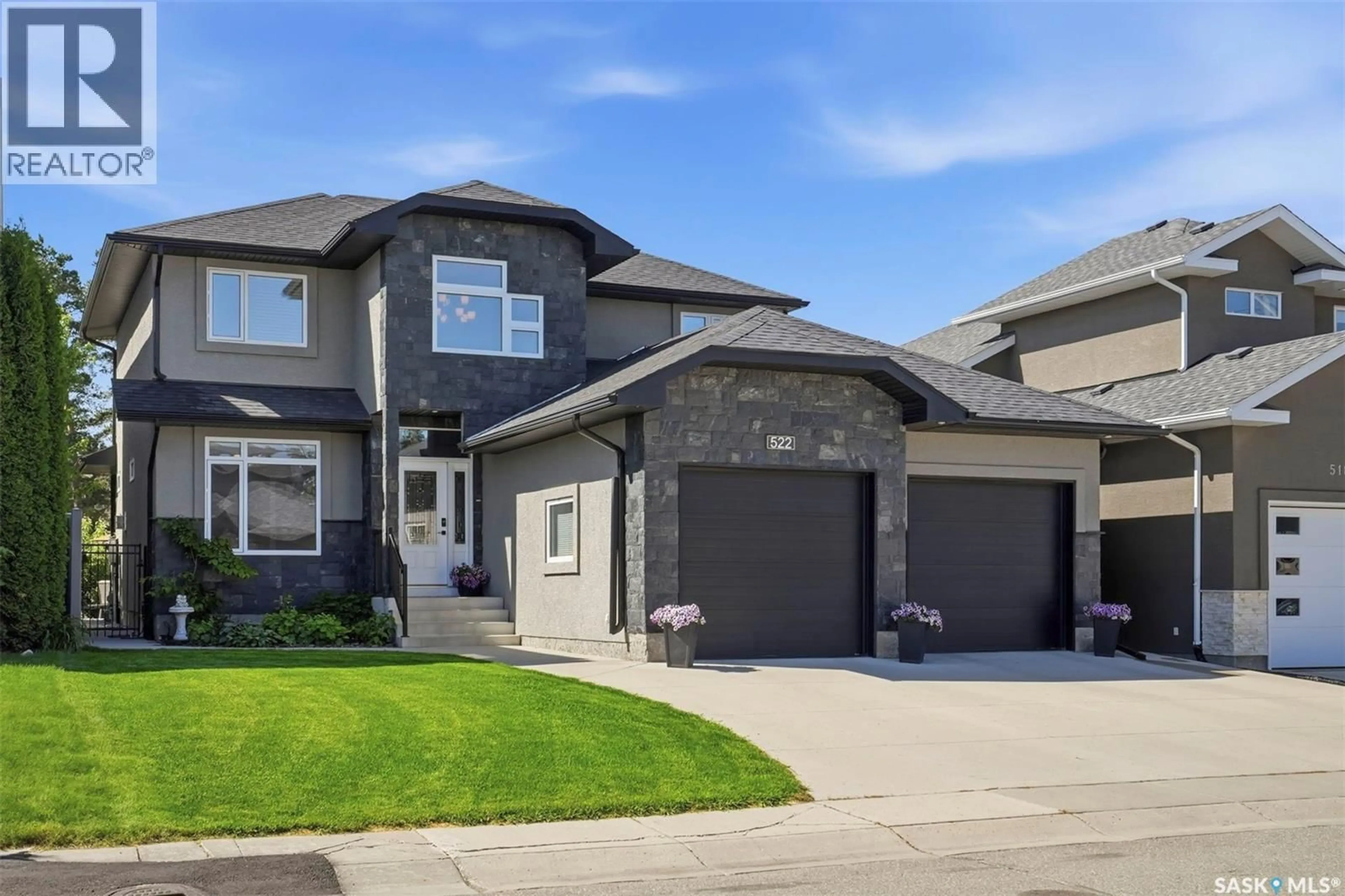 Home with brick exterior material, street for 522 ATTON LANE, Saskatoon Saskatchewan S7W0K6