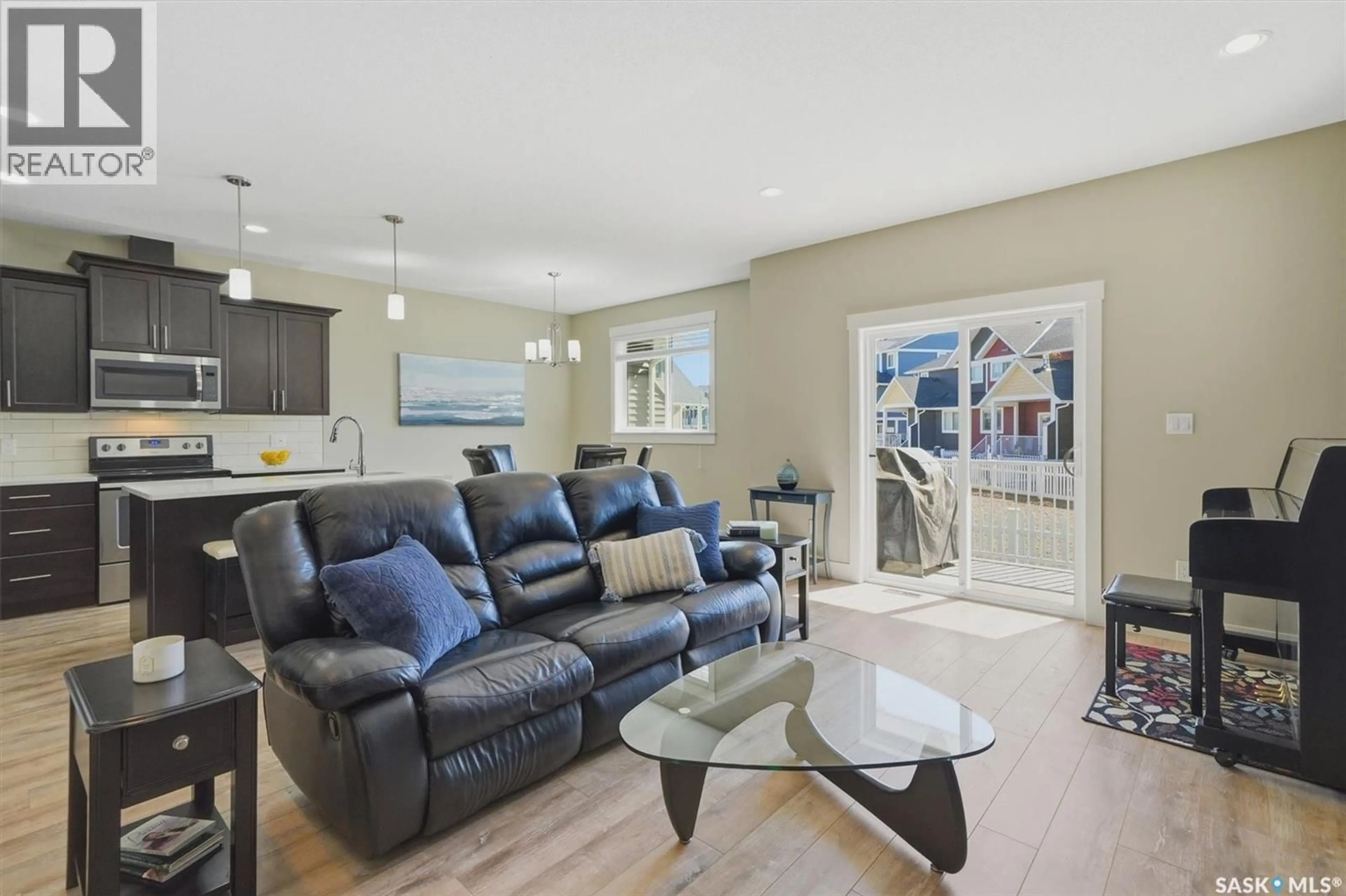 Living room with furniture, unknown for 108 900 ST ANDREWS LANE, Warman Saskatchewan S0K4S4