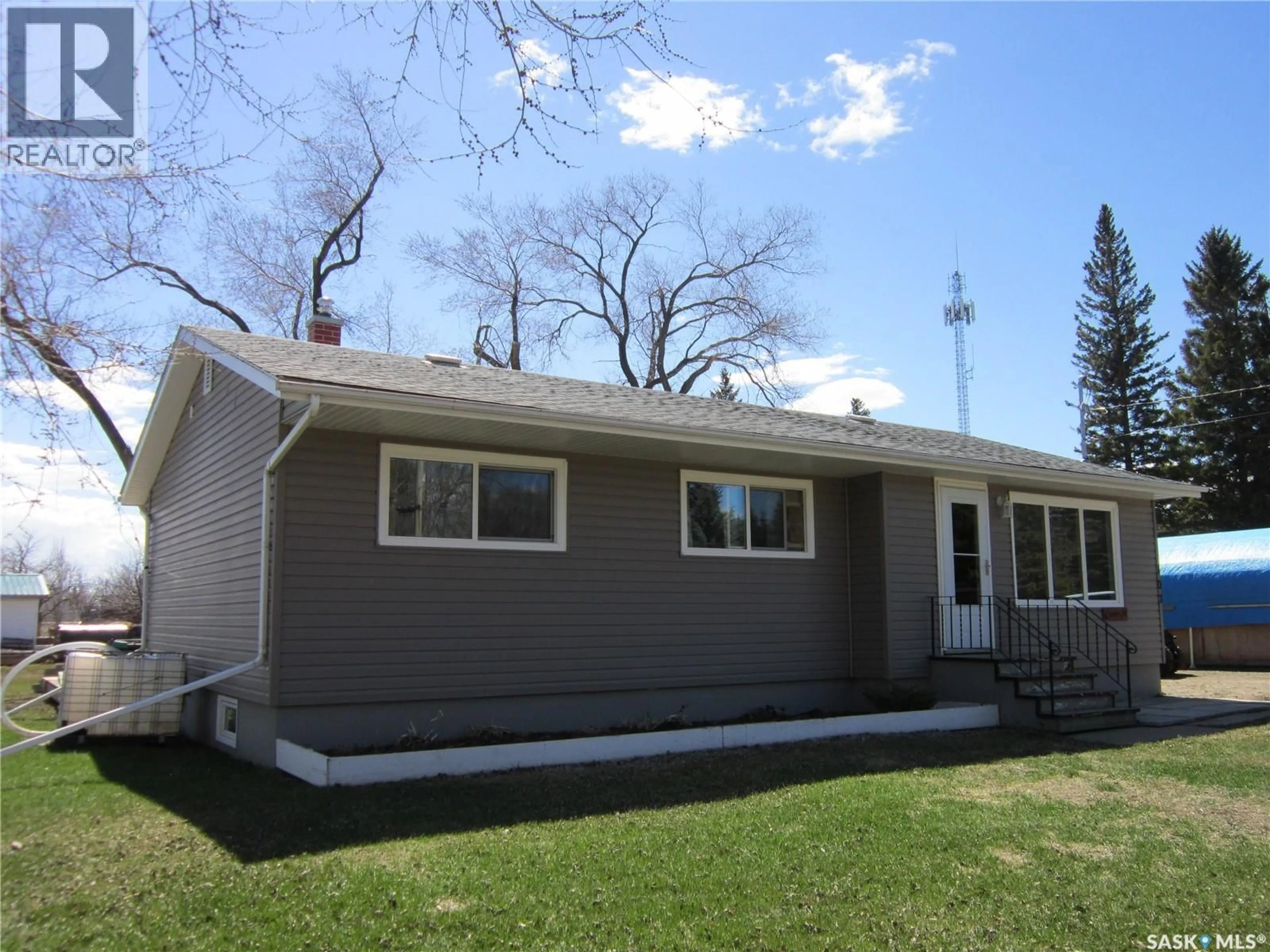 Home with vinyl exterior material, street for 103 1ST STREET, Arborfield Saskatchewan S0E0A0