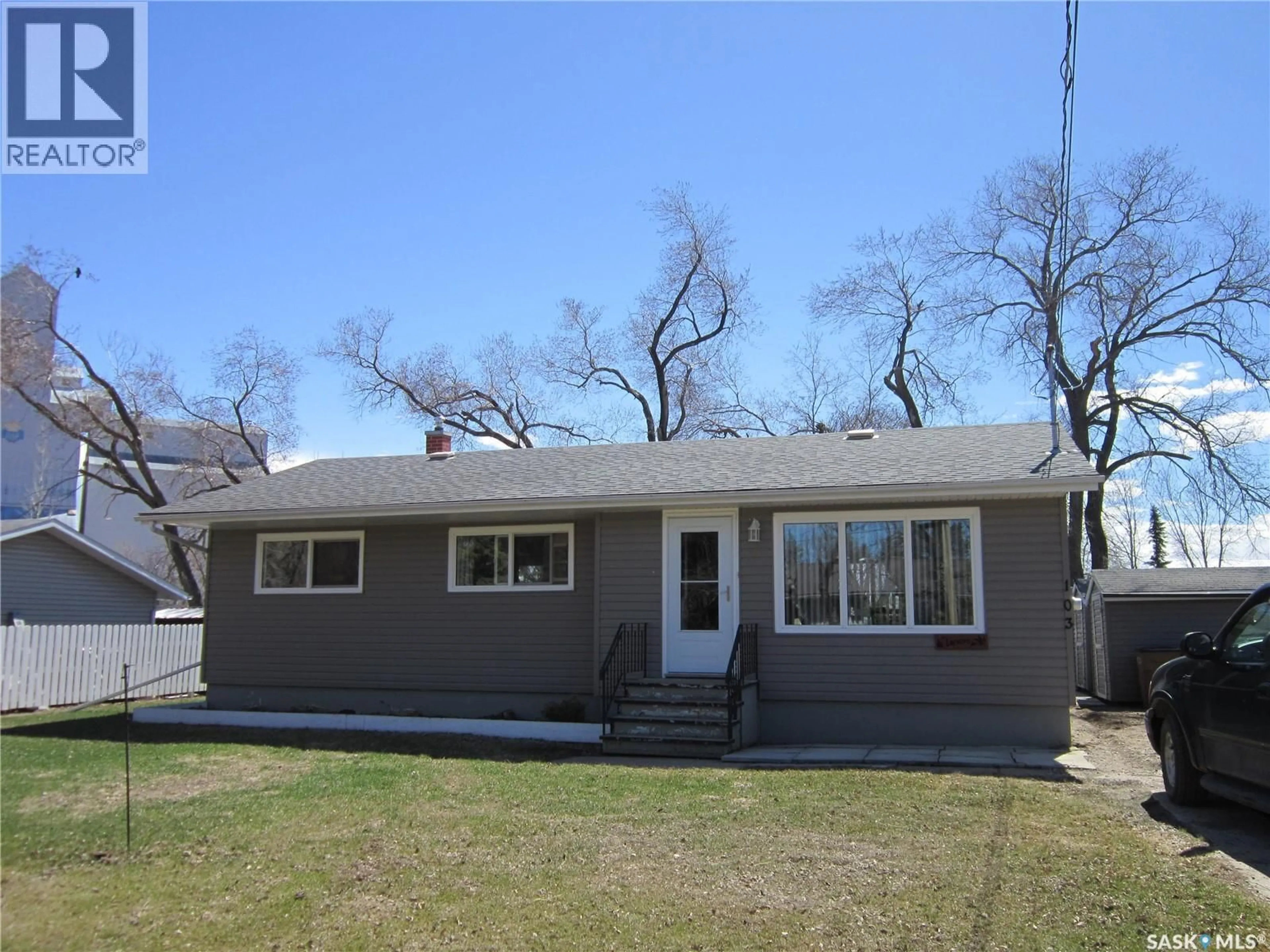 Home with vinyl exterior material, street for 103 1ST STREET, Arborfield Saskatchewan S0E0A0
