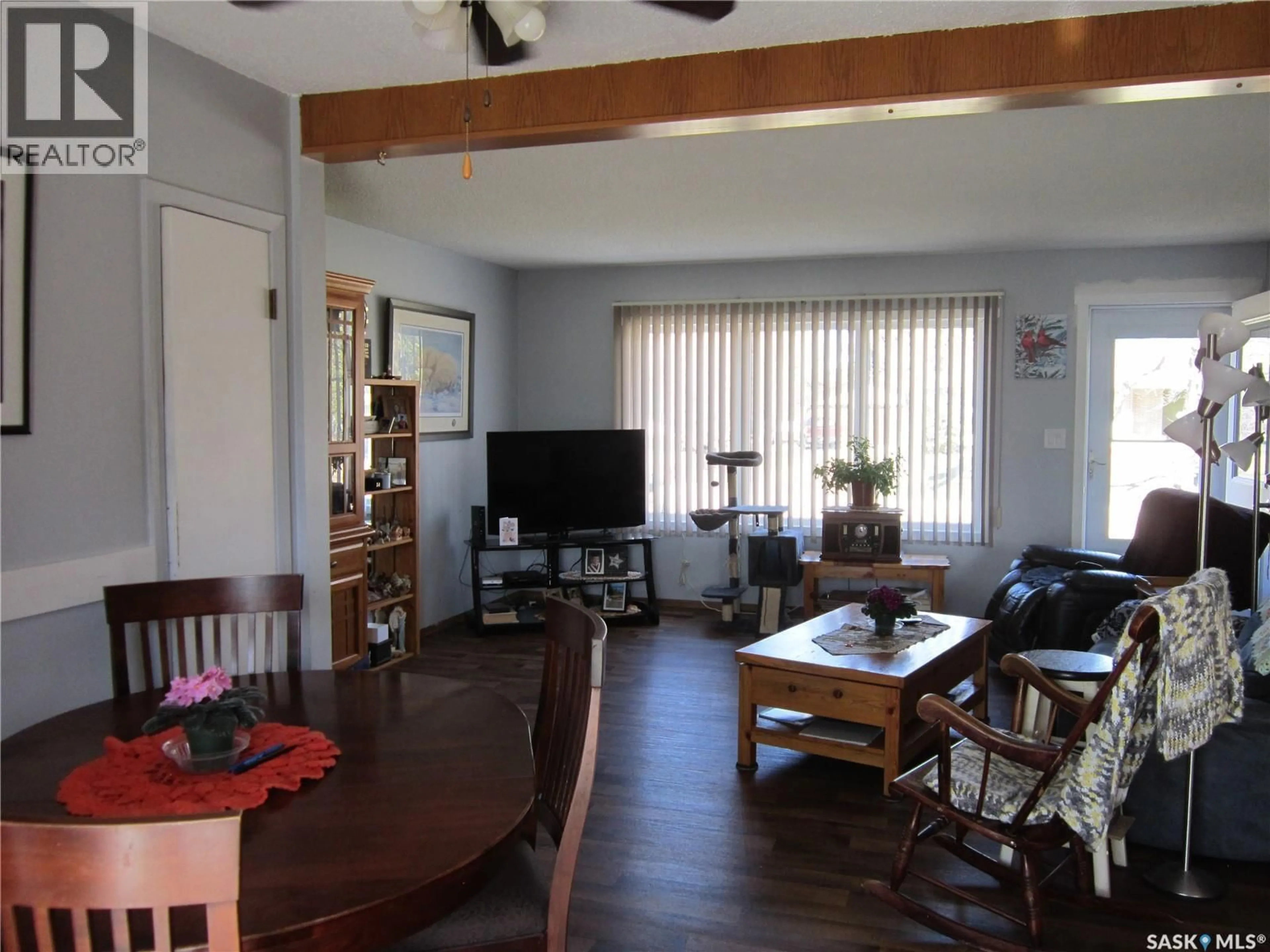Living room with furniture, wood/laminate floor for 103 1ST STREET, Arborfield Saskatchewan S0E0A0