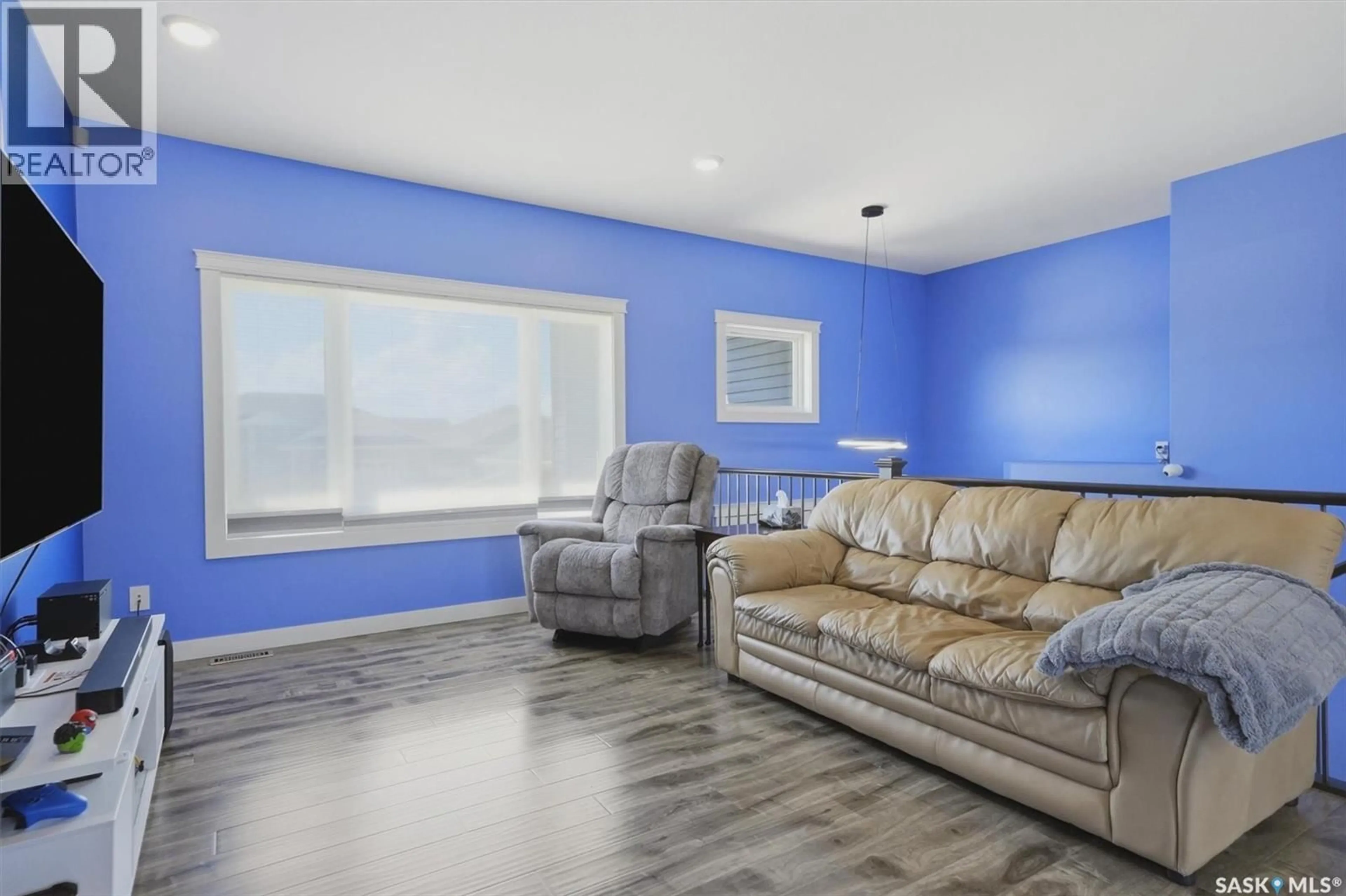 Living room with furniture, unknown for 604 PEBBLE BEACH BOULEVARD, Warman Saskatchewan S0K4S4