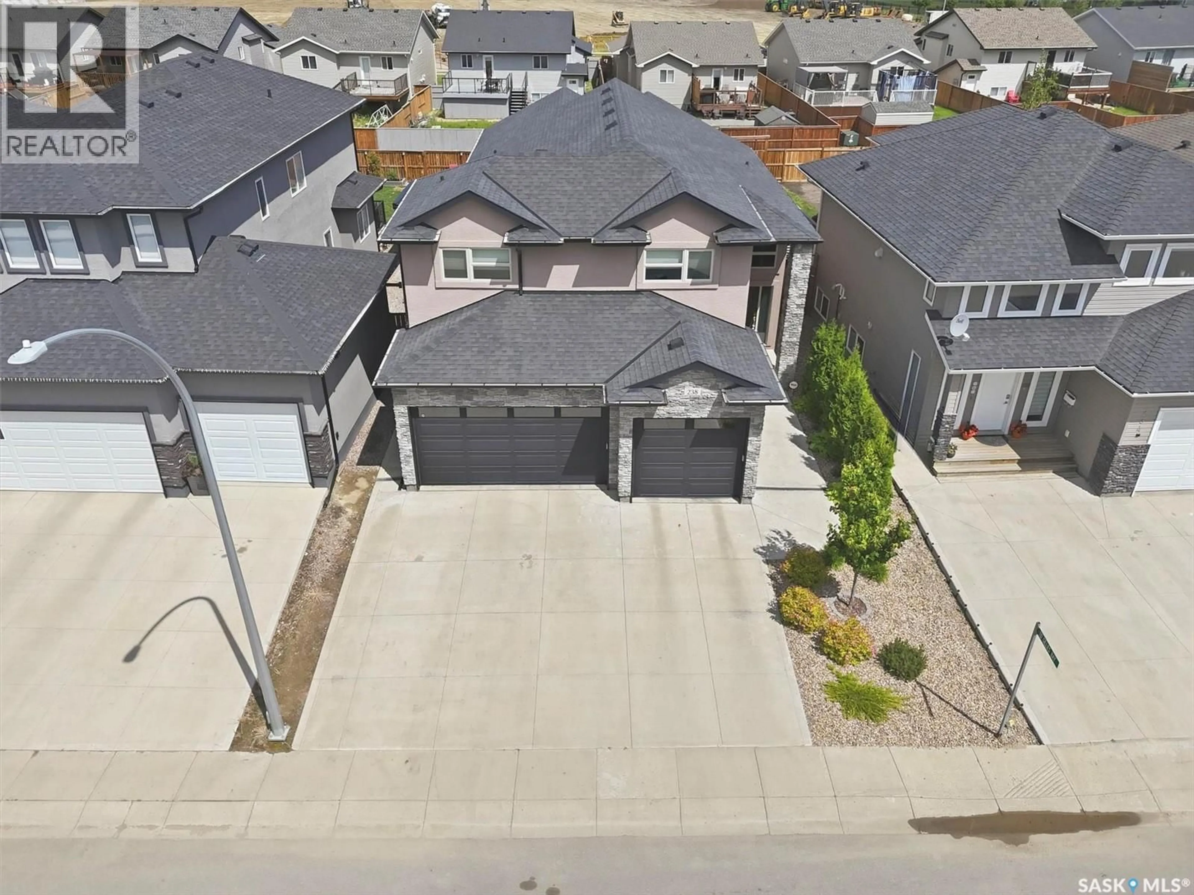 A pic from outside/outdoor area/front of a property/back of a property/a pic from drone, street for 238 GILLIES STREET, Saskatoon Saskatchewan S7V0J7