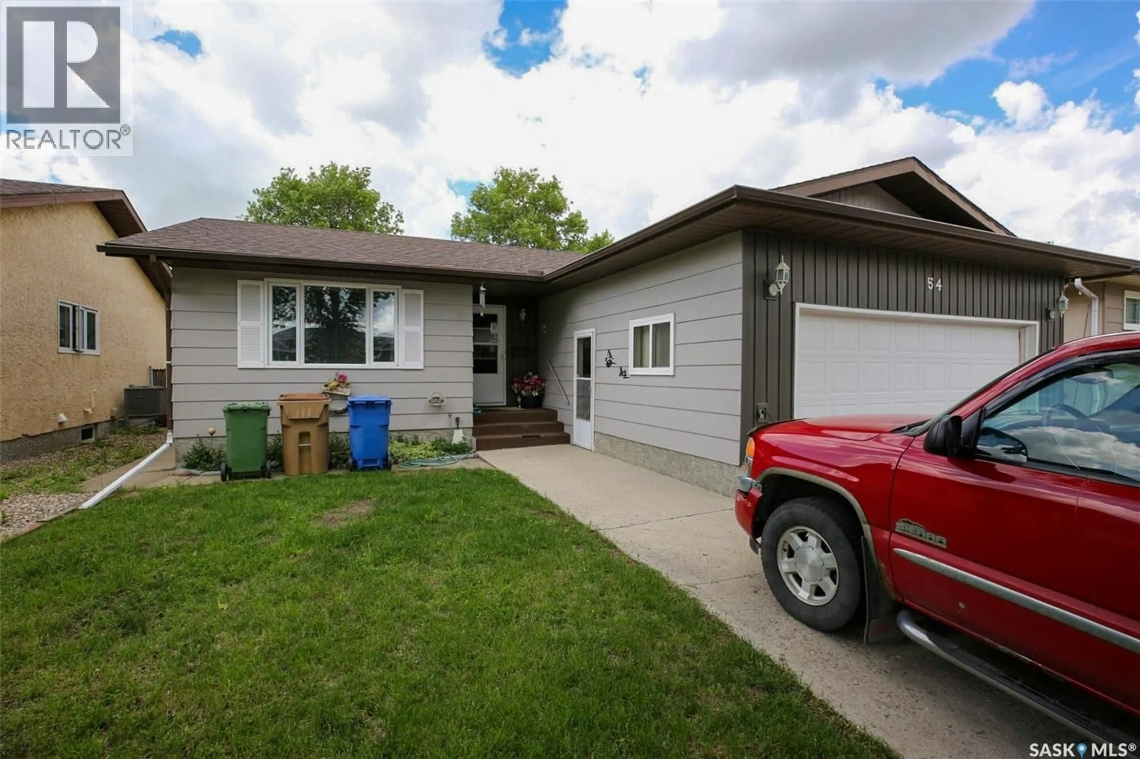 Home with vinyl exterior material, street for 54 SPRINGSTEIN AVENUE, Regina Saskatchewan S4R7K7