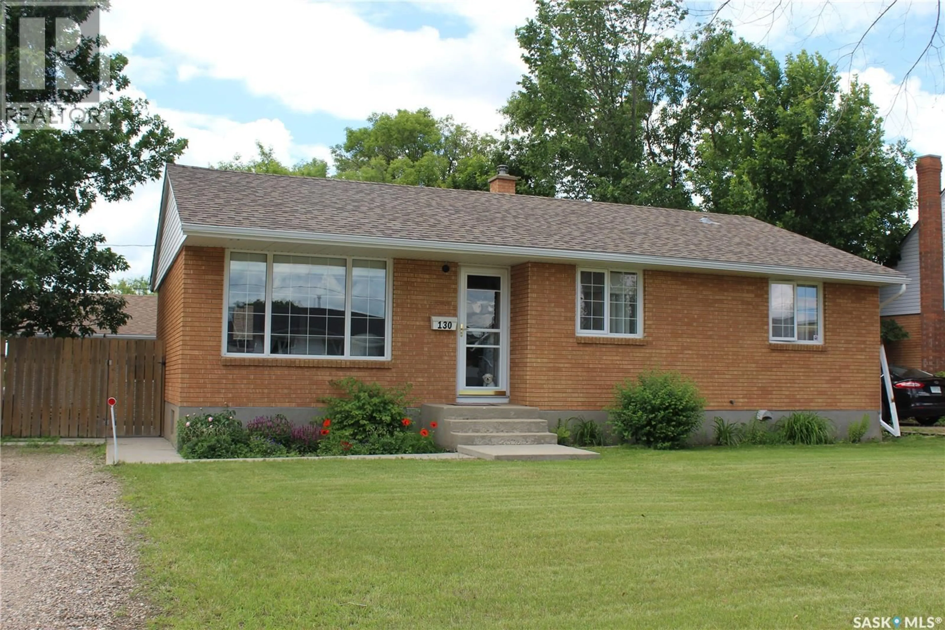 Home with brick exterior material, street for 130 MCDONALD ROAD, Estevan Saskatchewan S4A0B8