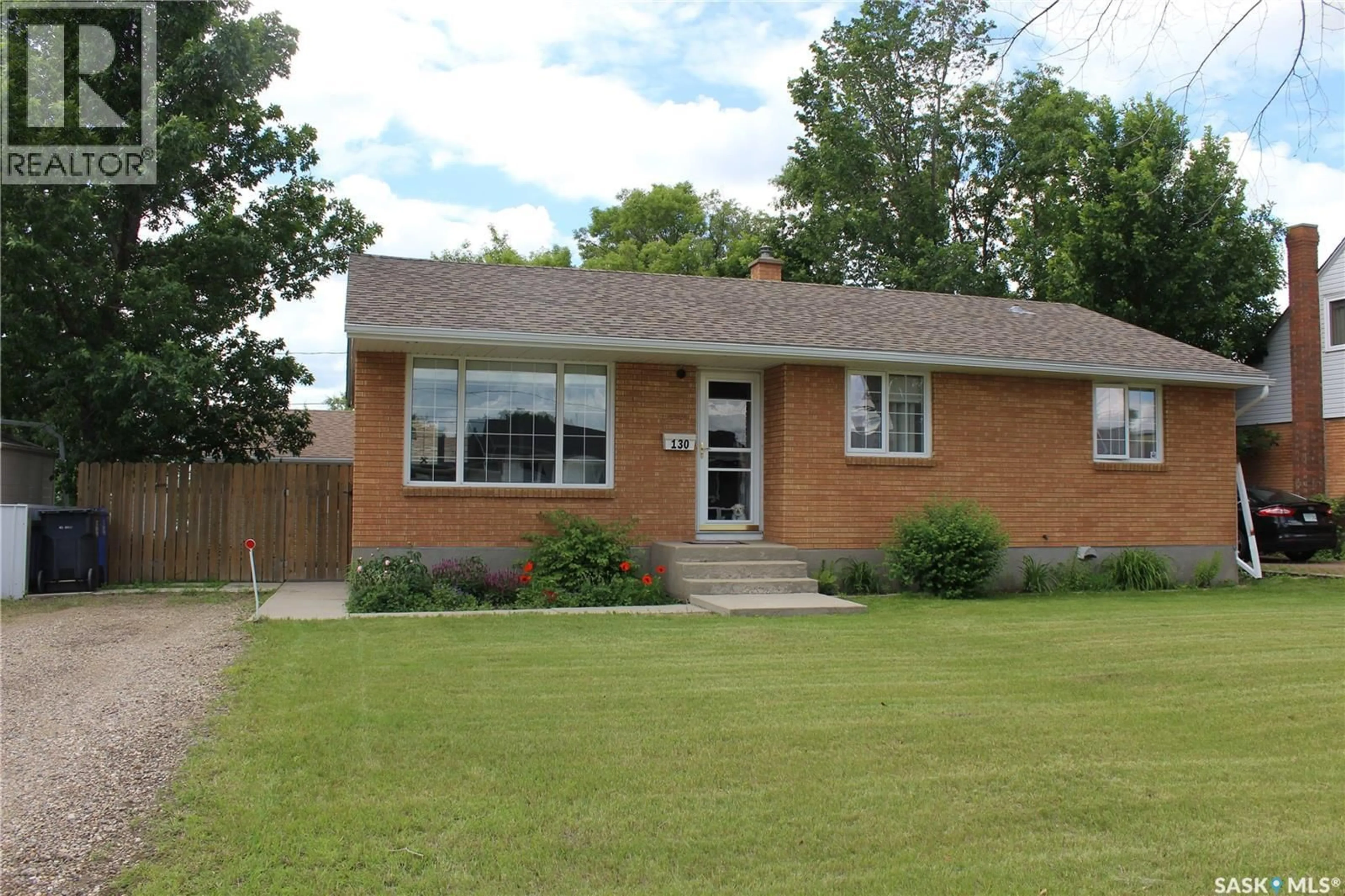 Home with brick exterior material, street for 130 MCDONALD ROAD, Estevan Saskatchewan S4A0B8