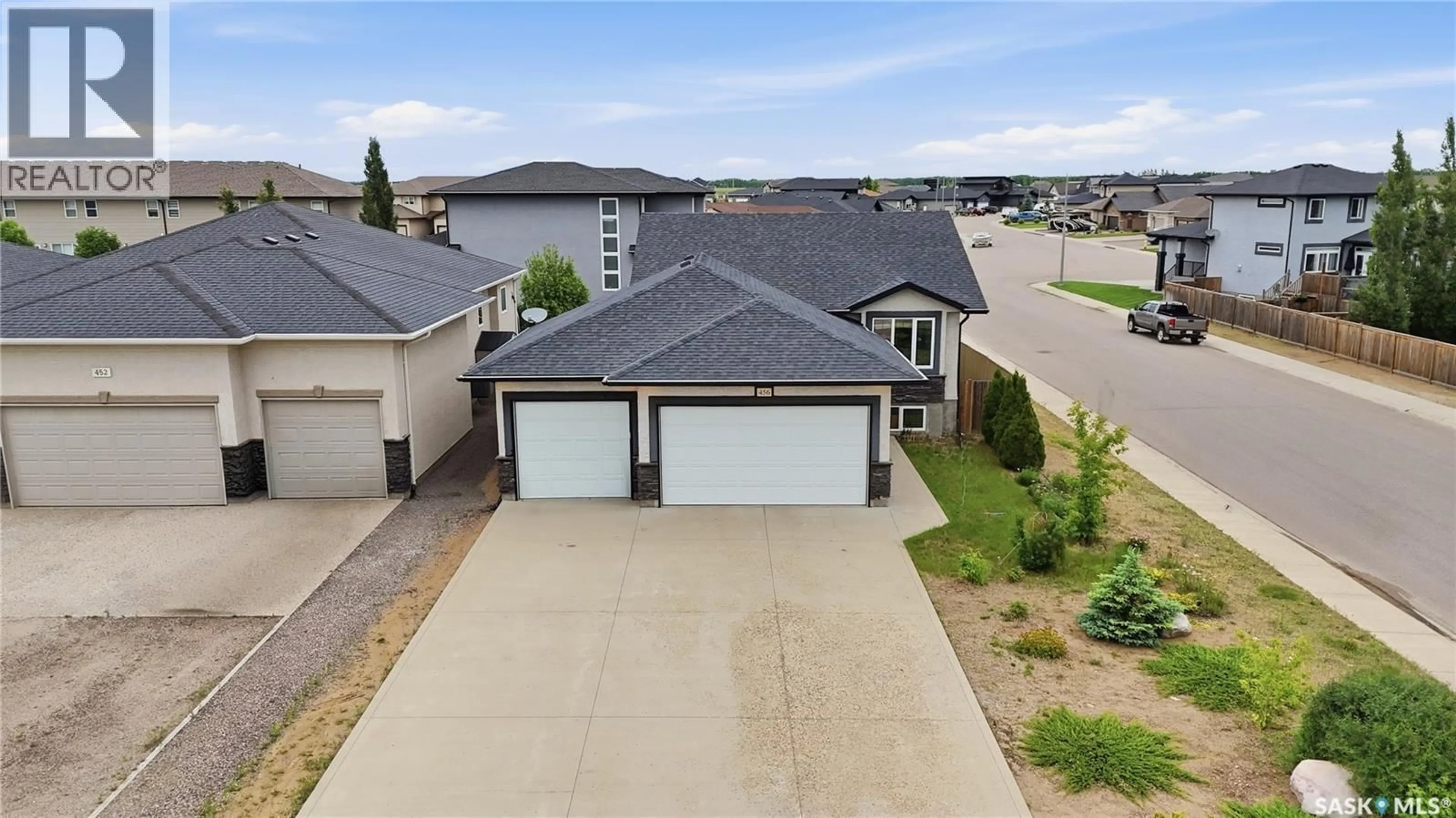 A pic from outside/outdoor area/front of a property/back of a property/a pic from drone, street for 456 5TH AVENUE, Pilot Butte Saskatchewan S0G3Z0