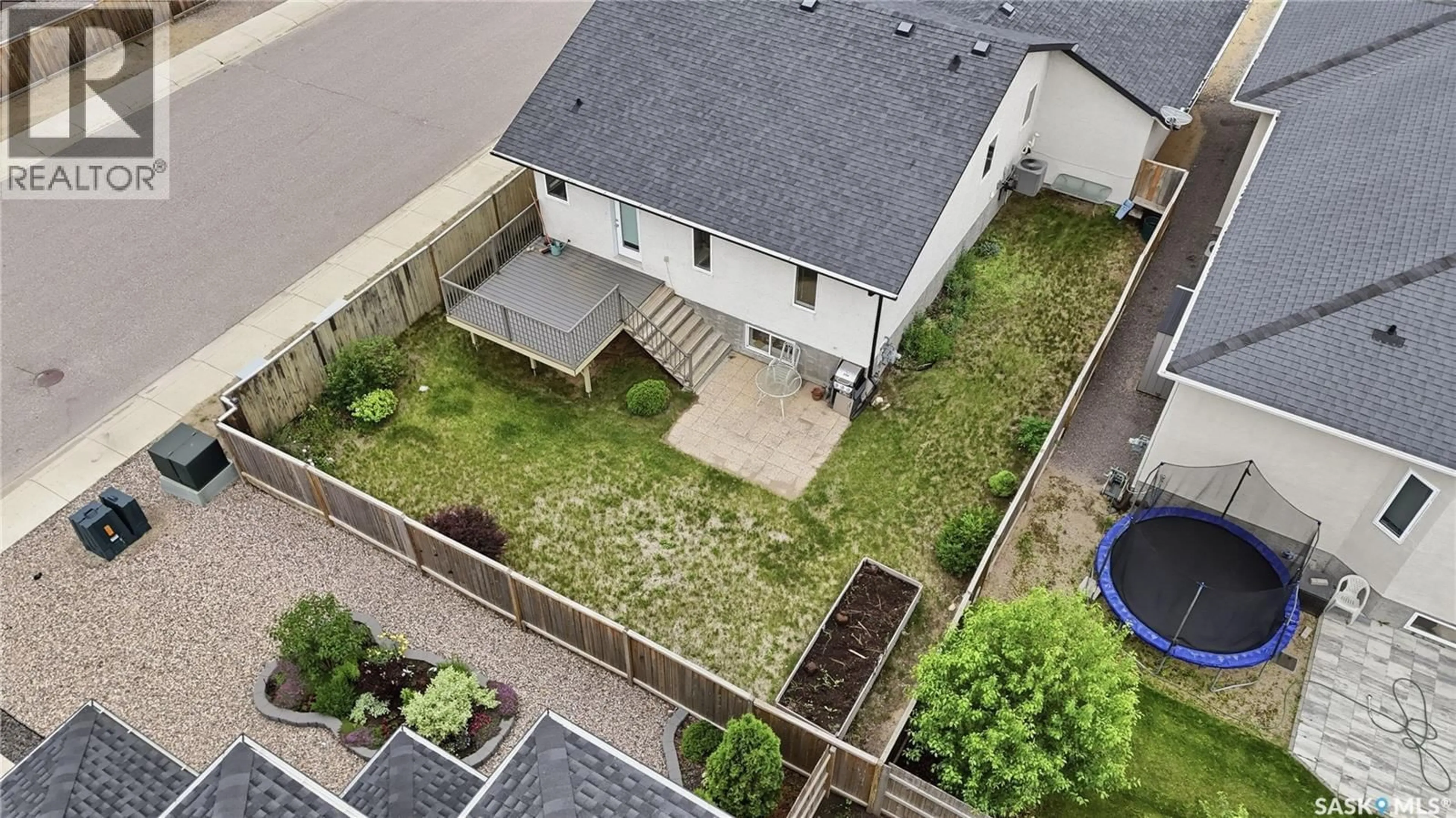 A pic from outside/outdoor area/front of a property/back of a property/a pic from drone, street for 456 5TH AVENUE, Pilot Butte Saskatchewan S0G3Z0