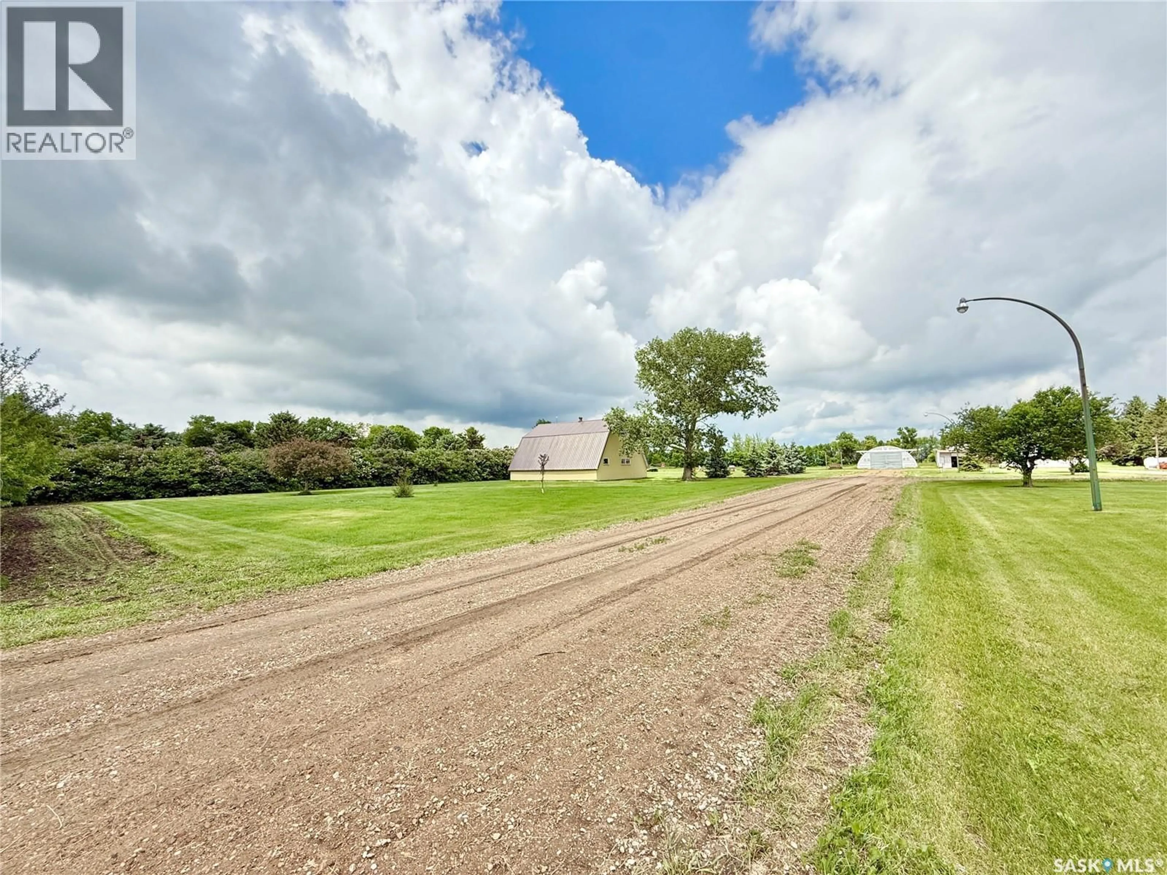 A pic from outside/outdoor area/front of a property/back of a property/a pic from drone, street for WEYBURN PROBE ACREAGE, Weyburn Rm No. 67 Saskatchewan S4H2K1