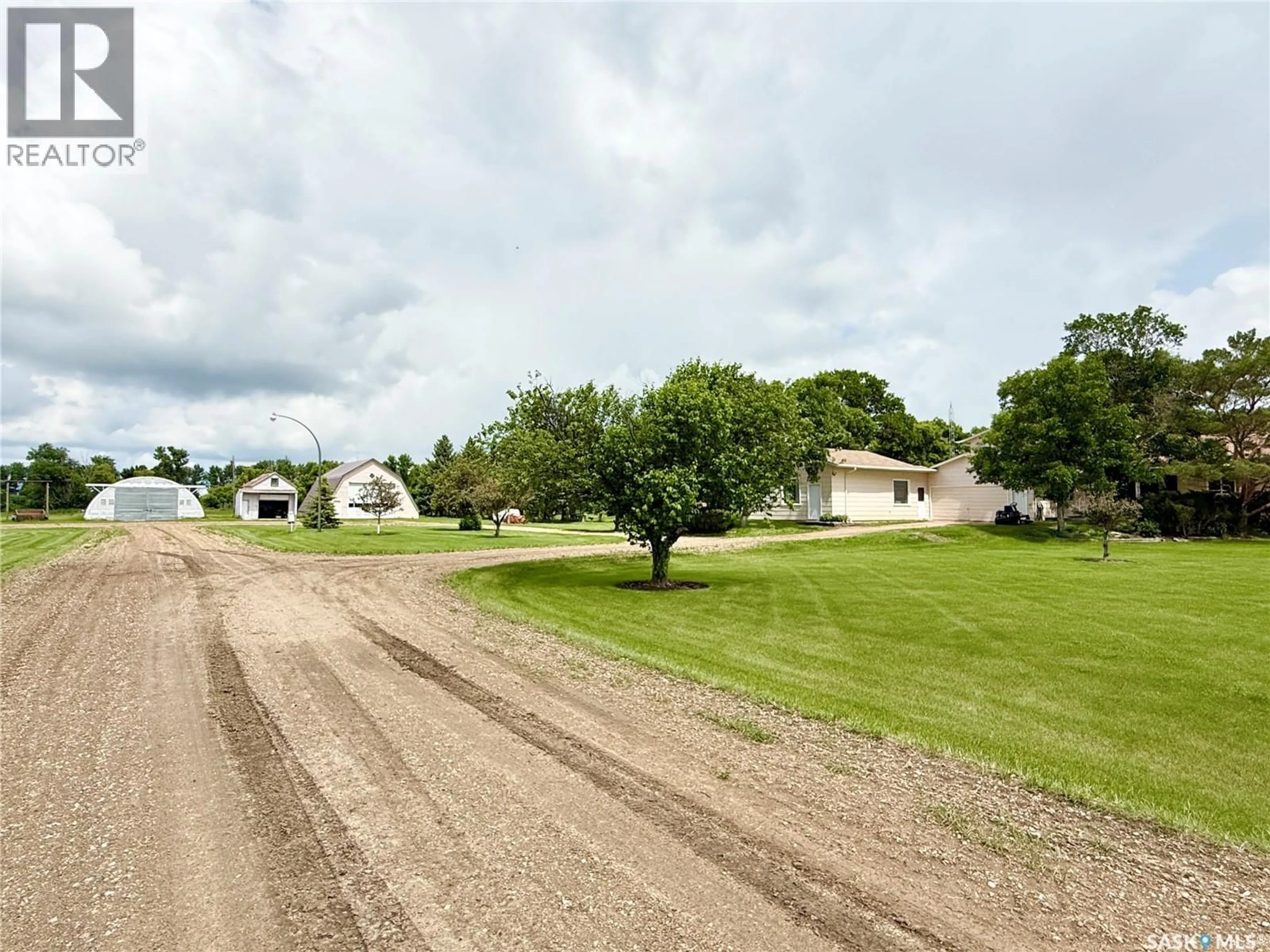 A pic from outside/outdoor area/front of a property/back of a property/a pic from drone, street for WEYBURN PROBE ACREAGE, Weyburn Rm No. 67 Saskatchewan S4H2K1