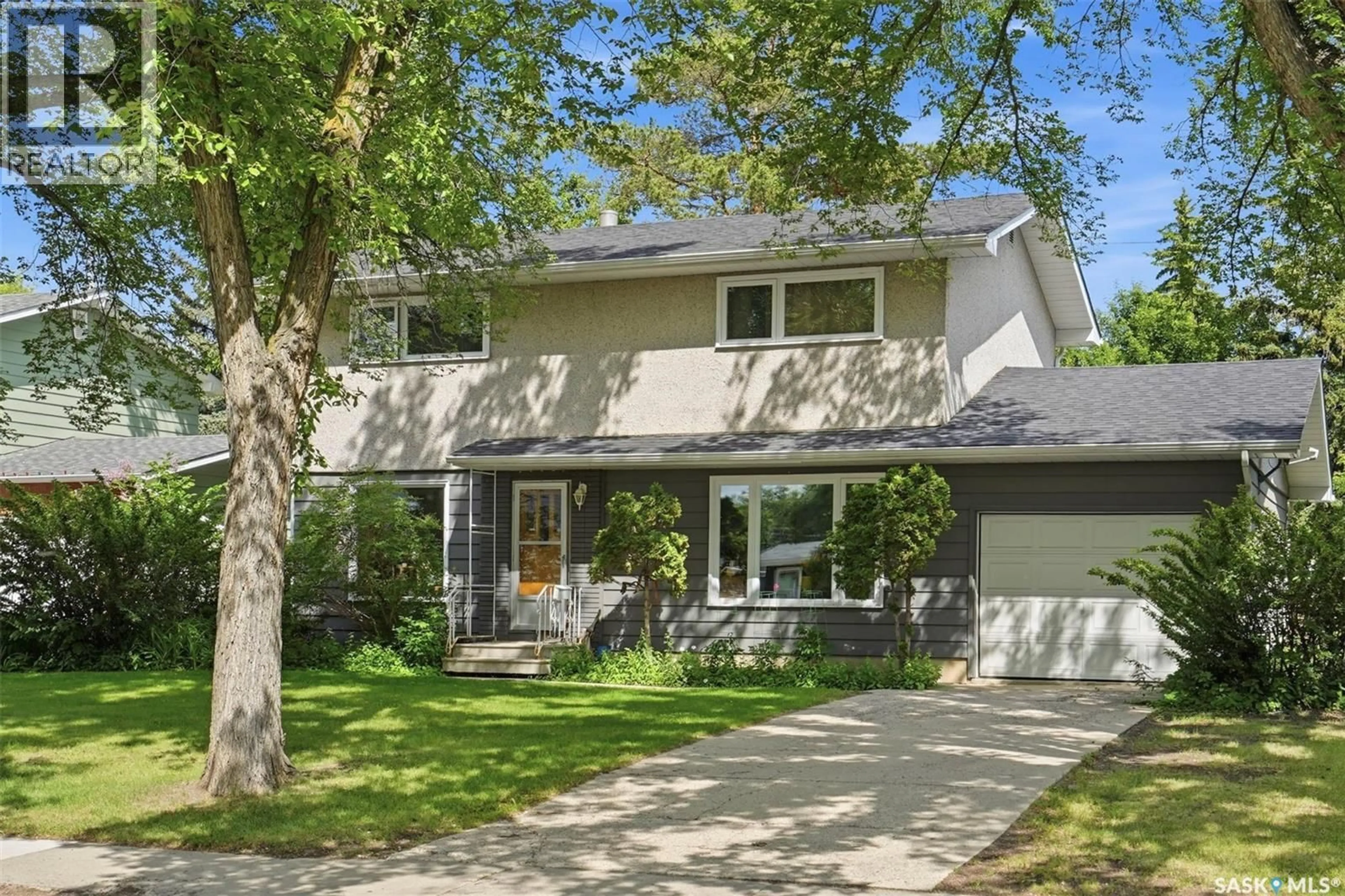 Home with vinyl exterior material, street for 22 RUTTER CRESCENT, Saskatoon Saskatchewan S7H3B7