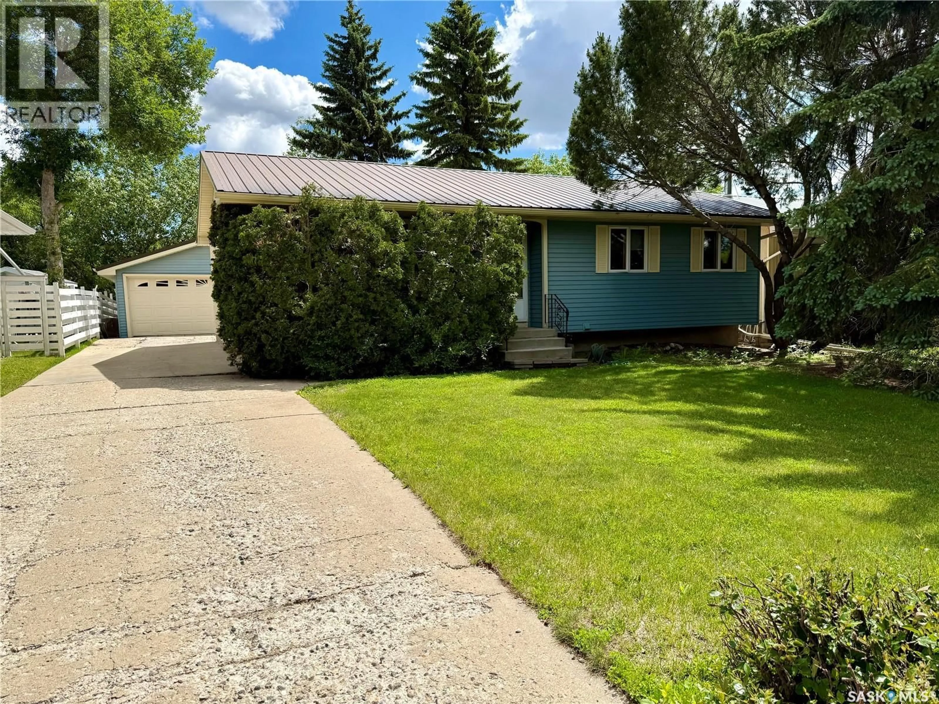 Home with vinyl exterior material, street for 15 FUHRMANN CRESCENT, Regina Saskatchewan S4R5S4