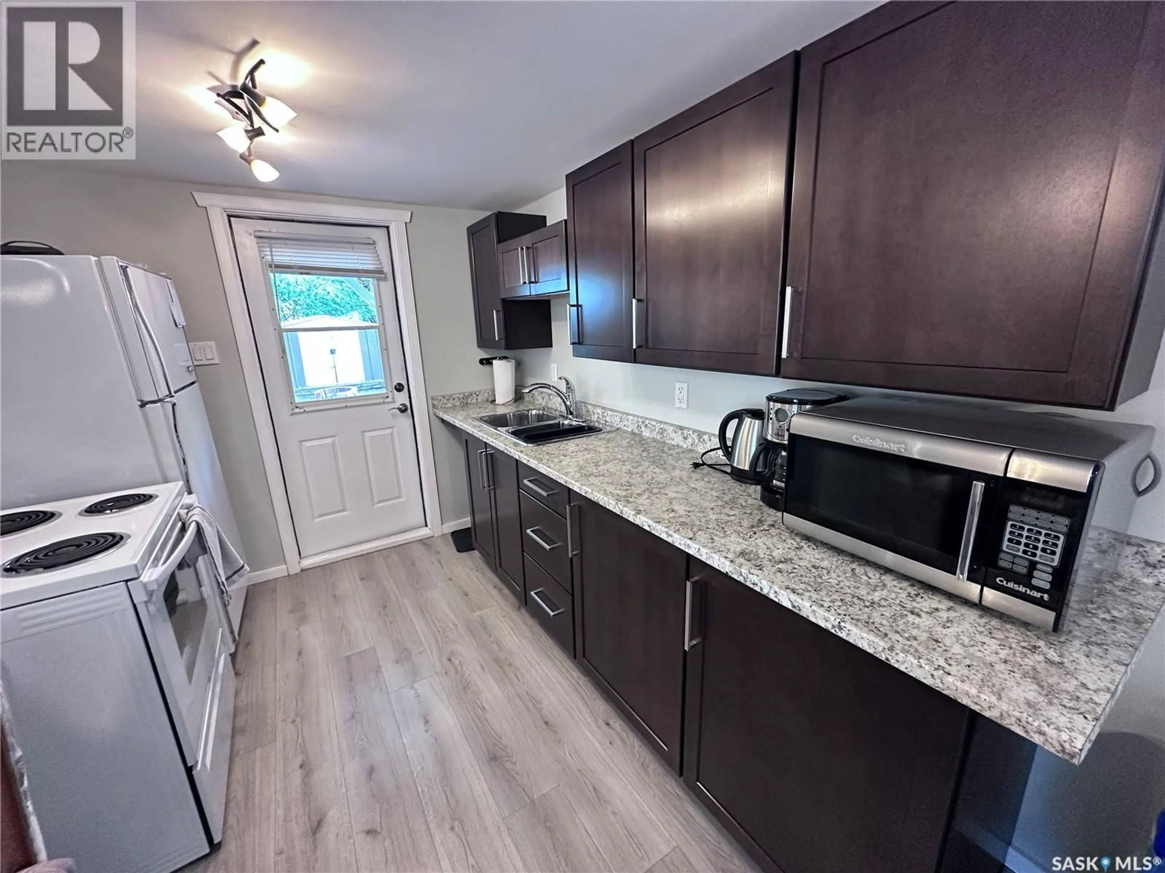 Standard kitchen, wood/laminate floor for 921 JOSEPH CRESCENT, Cochin Saskatchewan S0M0L0