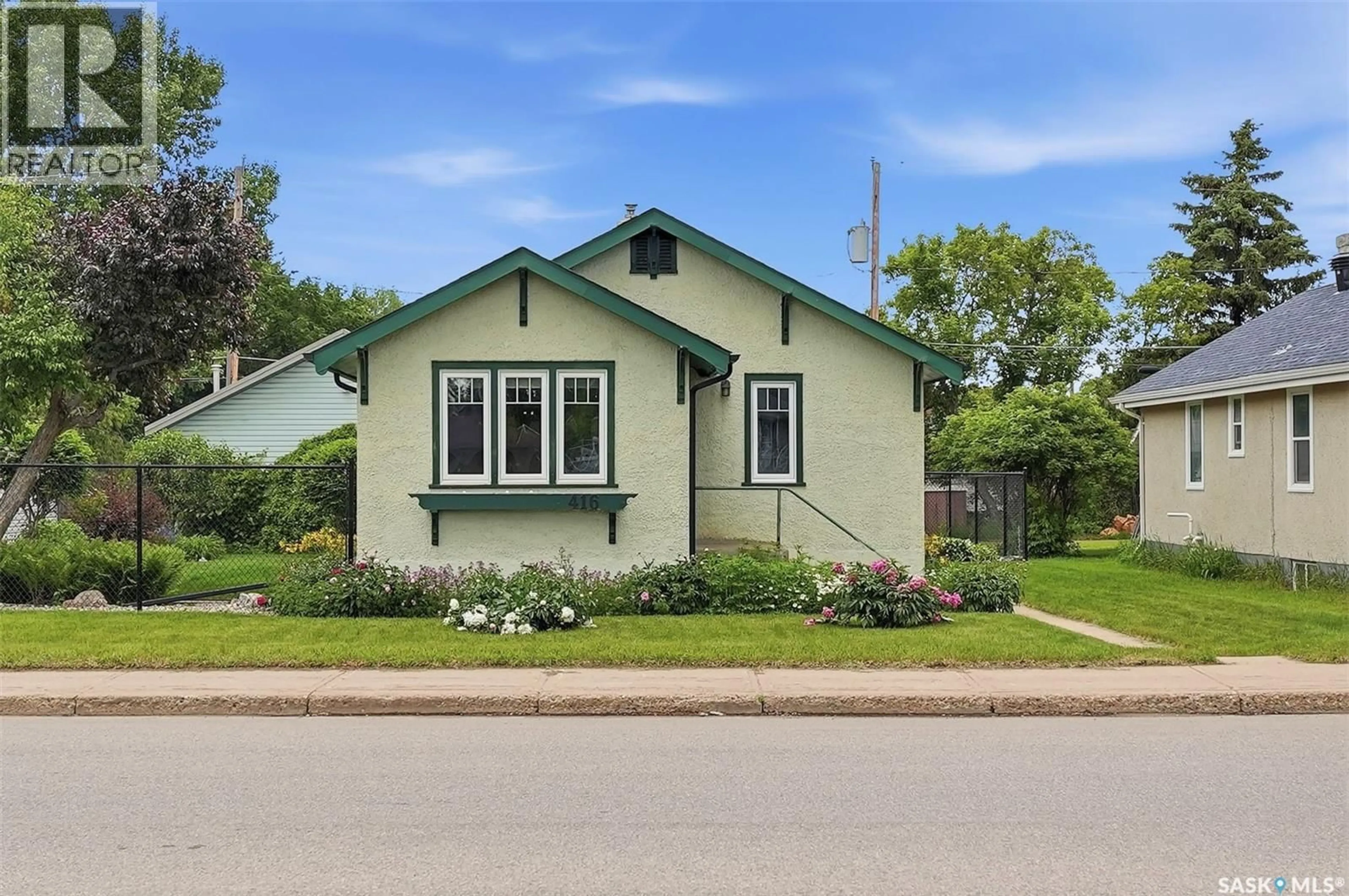 Home with vinyl exterior material, street for 416 22ND STREET, Prince Albert Saskatchewan S6V4K6