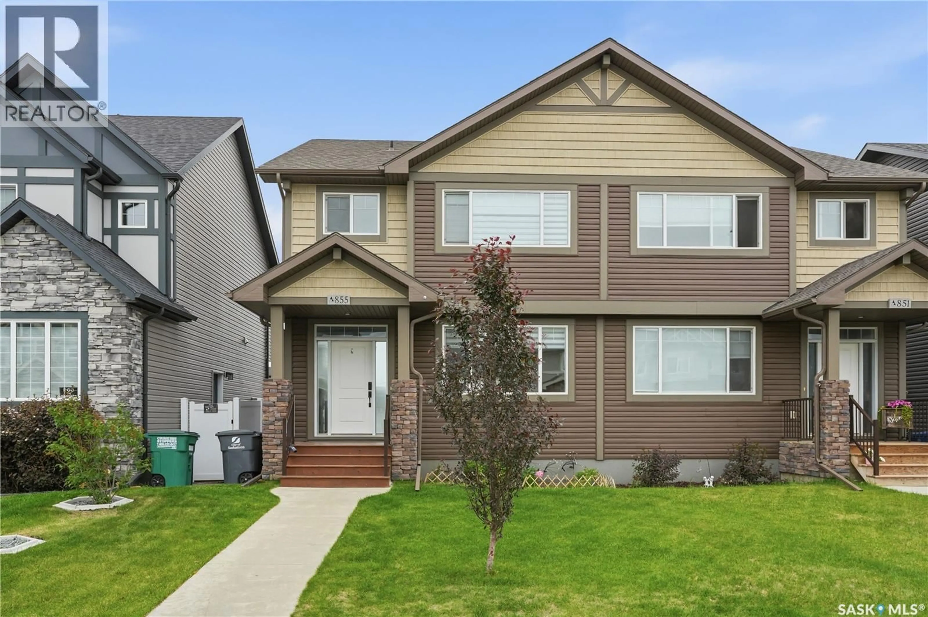Home with vinyl exterior material, street for 855 MCFAULL RISE, Saskatoon Saskatchewan S7V0S5
