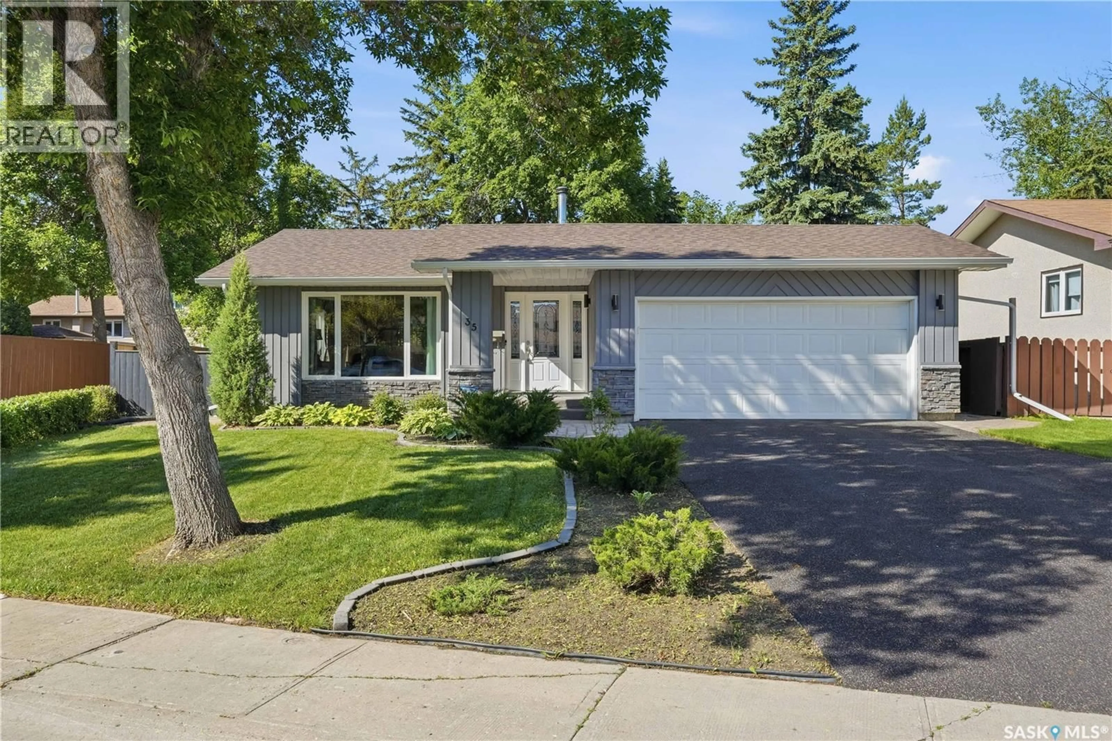 Home with vinyl exterior material, street for 35 PENFOLD PLACE, Regina Saskatchewan S4V0J7
