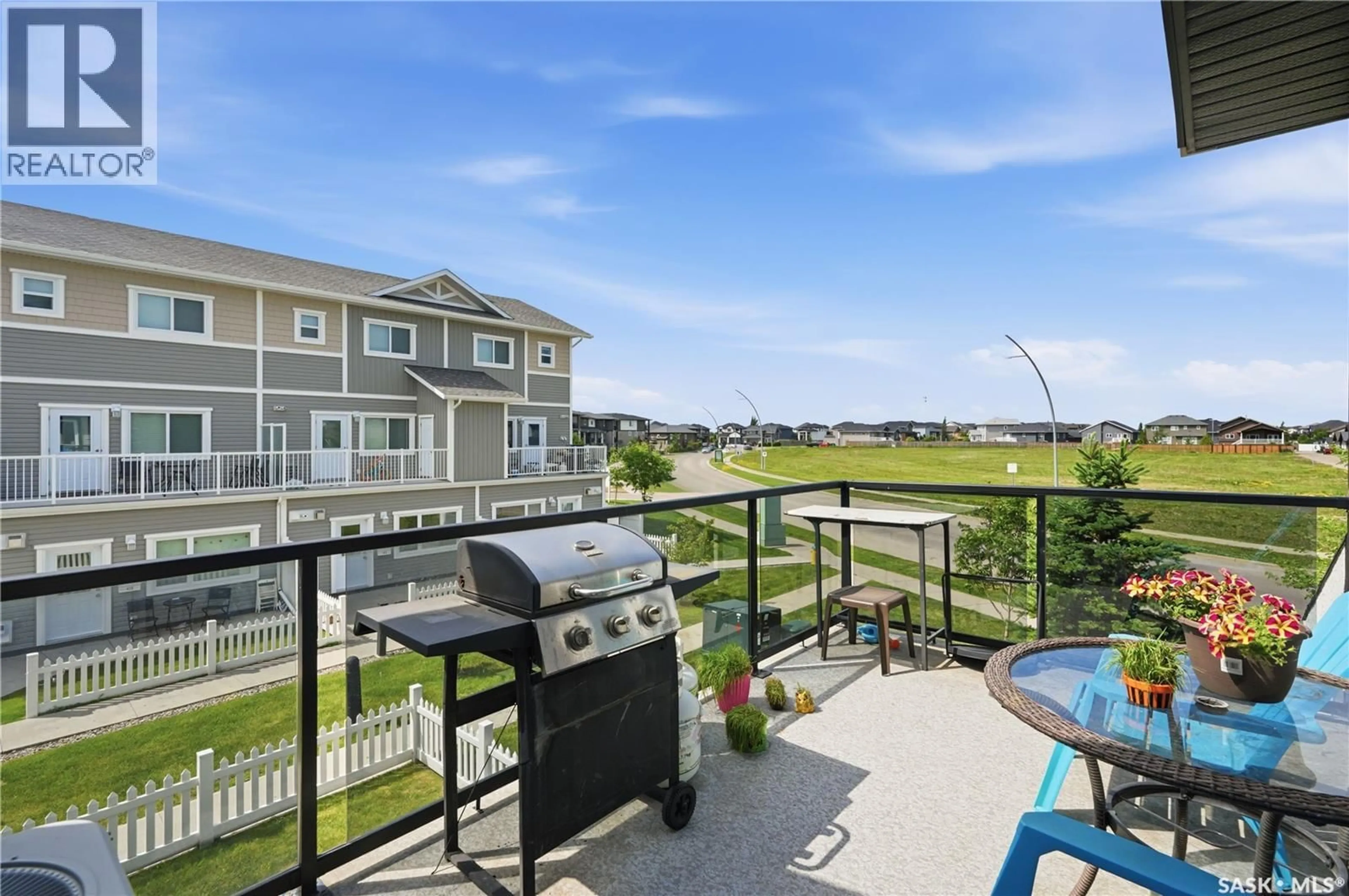 Patio, water/lake/river/ocean view for 130 - 1218 MARLATTE CRESCENT, Saskatoon Saskatchewan S7W0W1