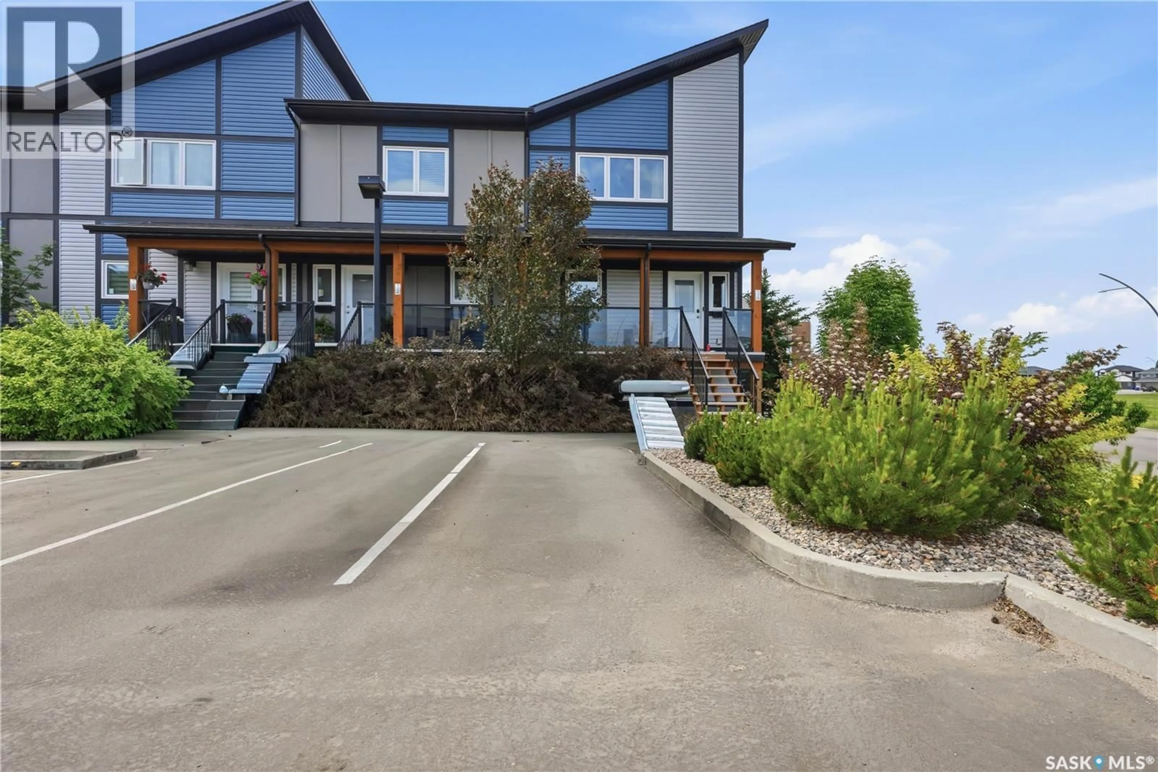 A pic from outside/outdoor area/front of a property/back of a property/a pic from drone, unknown for 130 - 1218 MARLATTE CRESCENT, Saskatoon Saskatchewan S7W0W1