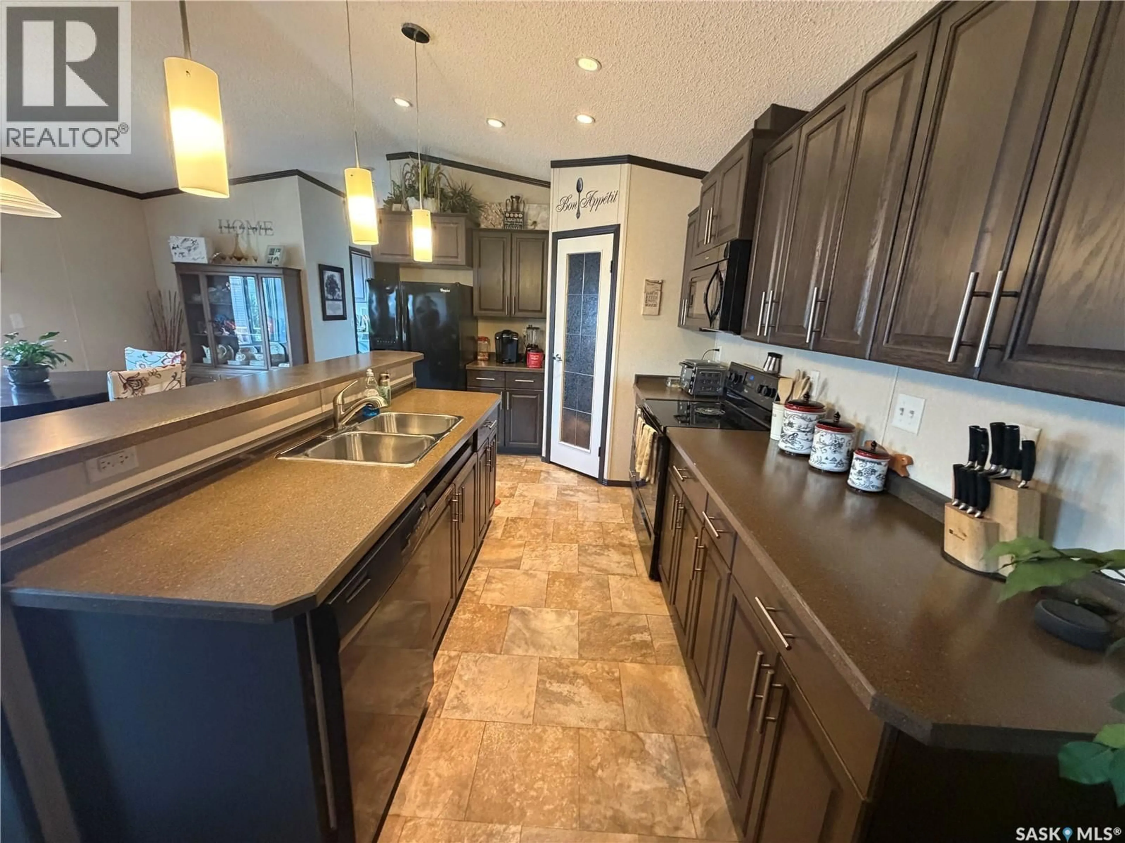 Open concept kitchen, ceramic/tile floor for 74 MULBERRY ROAD, Blucher Rm No. 343 Saskatchewan S7B0A4
