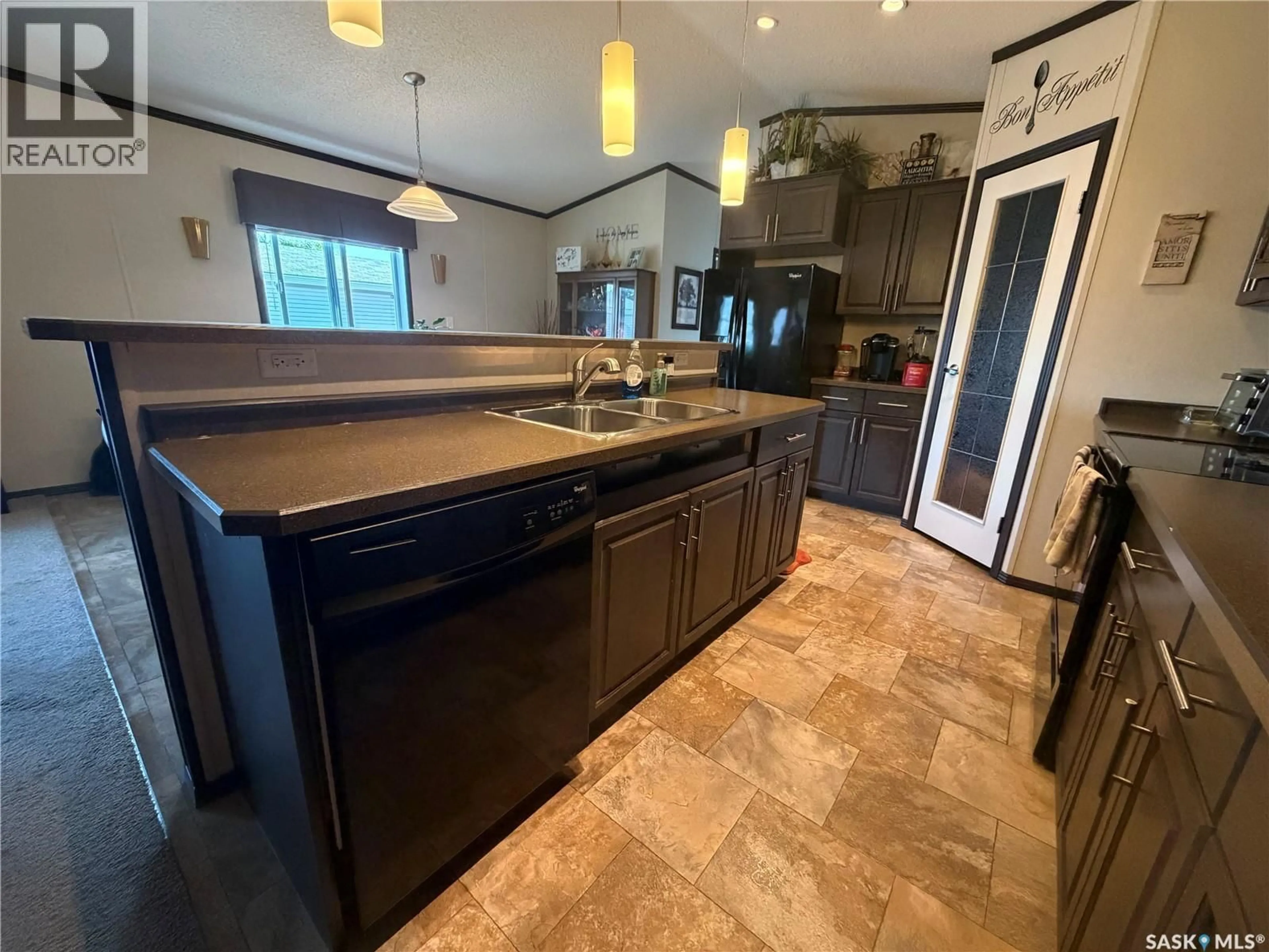 Open concept kitchen, ceramic/tile floor for 74 MULBERRY ROAD, Blucher Rm No. 343 Saskatchewan S7B0A4