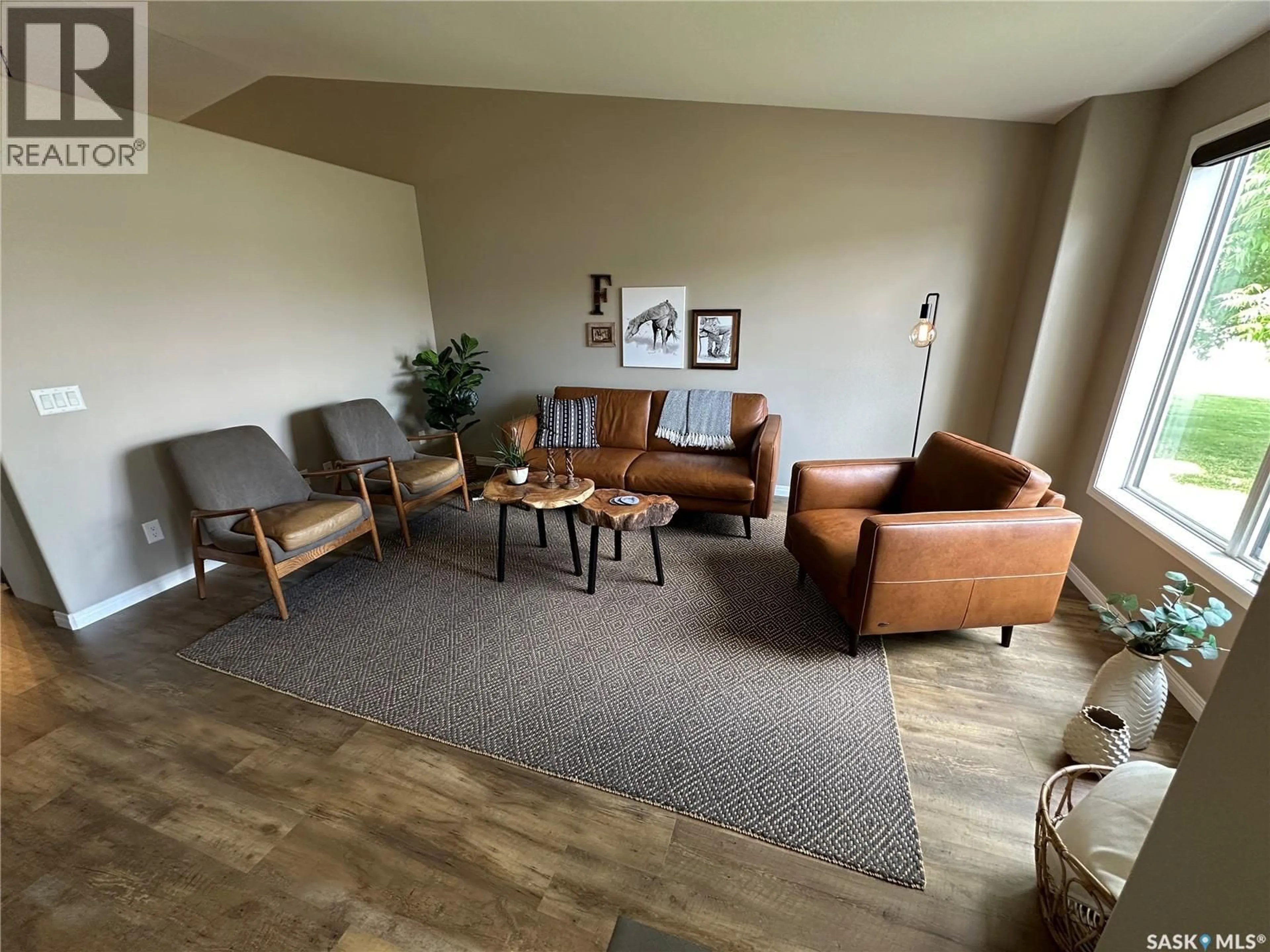 Living room with furniture, unknown for 550 10TH AVENUE, Rosthern Saskatchewan S0K3R0