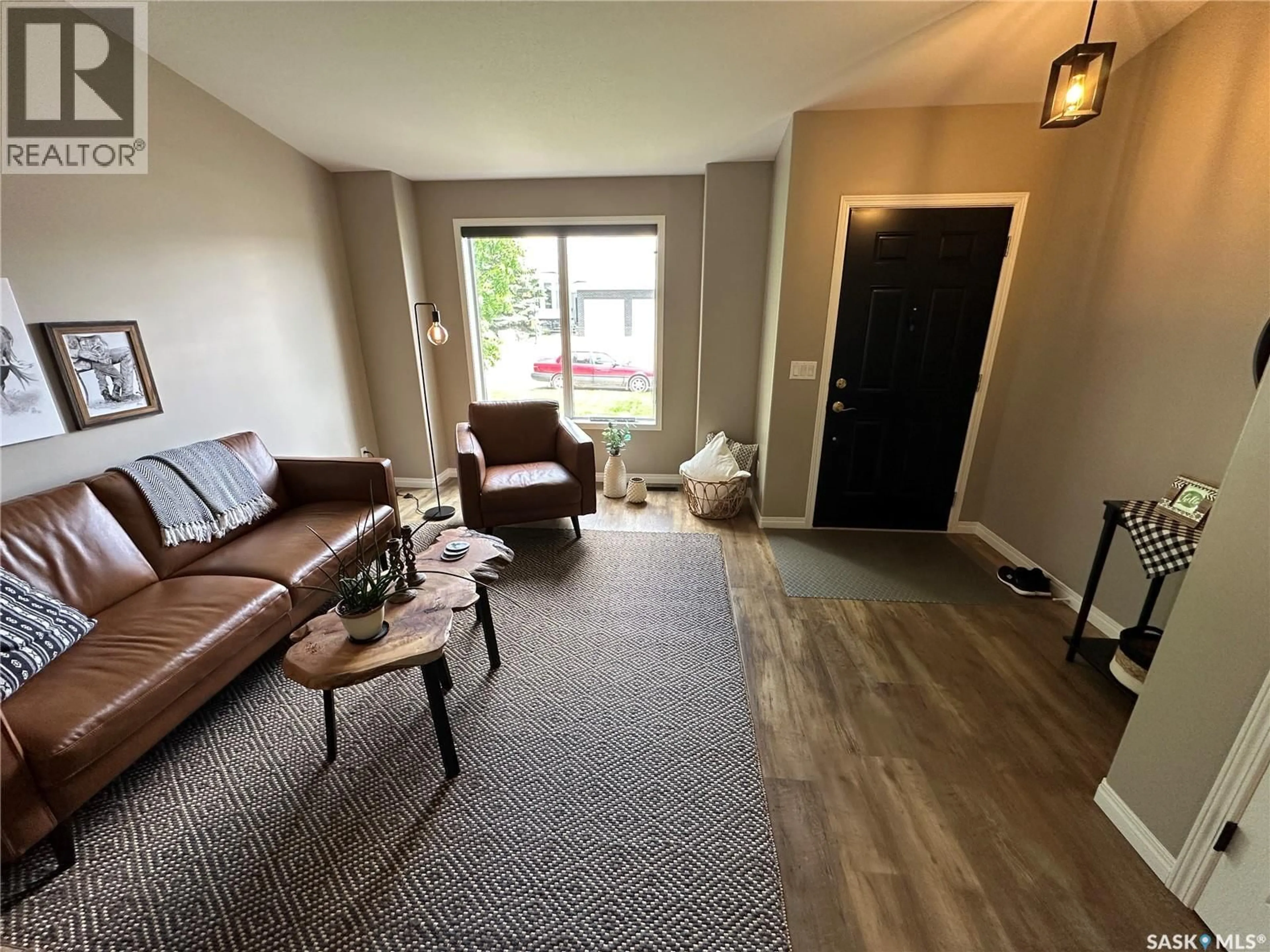 Living room with furniture, unknown for 550 10TH AVENUE, Rosthern Saskatchewan S0K3R0