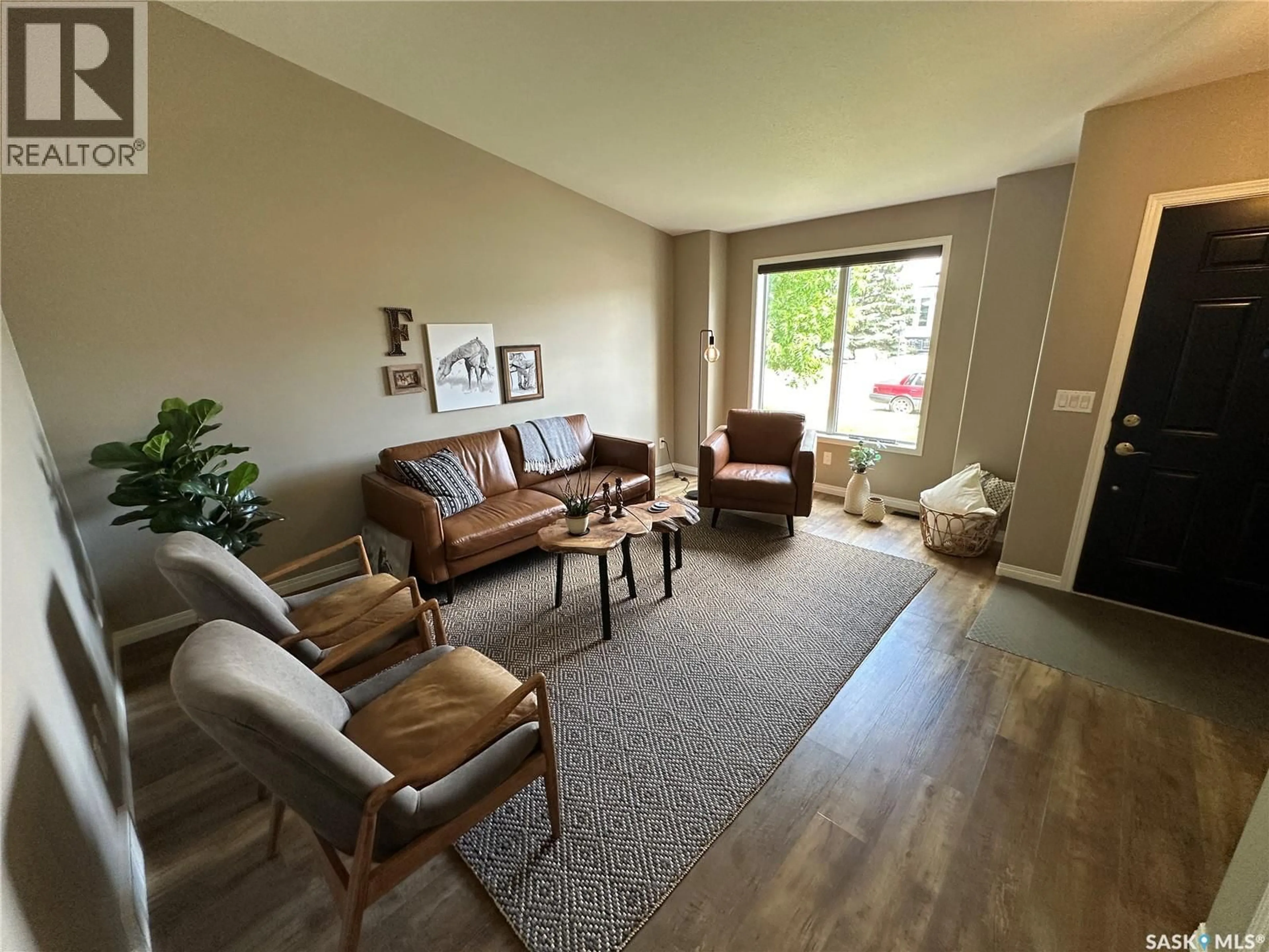 Living room with furniture, unknown for 550 10TH AVENUE, Rosthern Saskatchewan S0K3R0